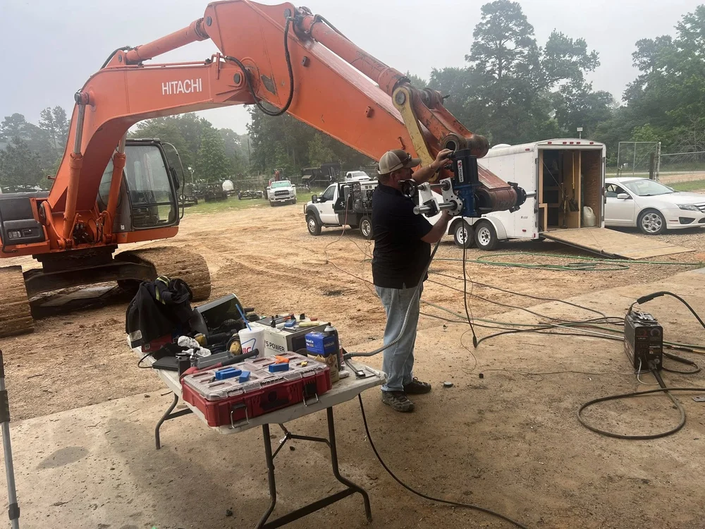 Crew and service equipment at a jobsite