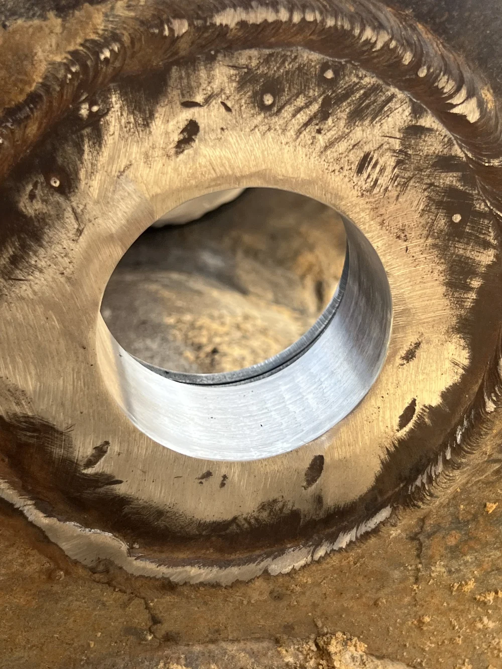 Machined bore in an equipment component