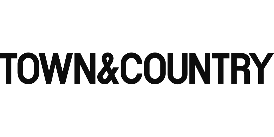 Black text logo with the words 'TOWN & COUNTRY' in bold capital letters