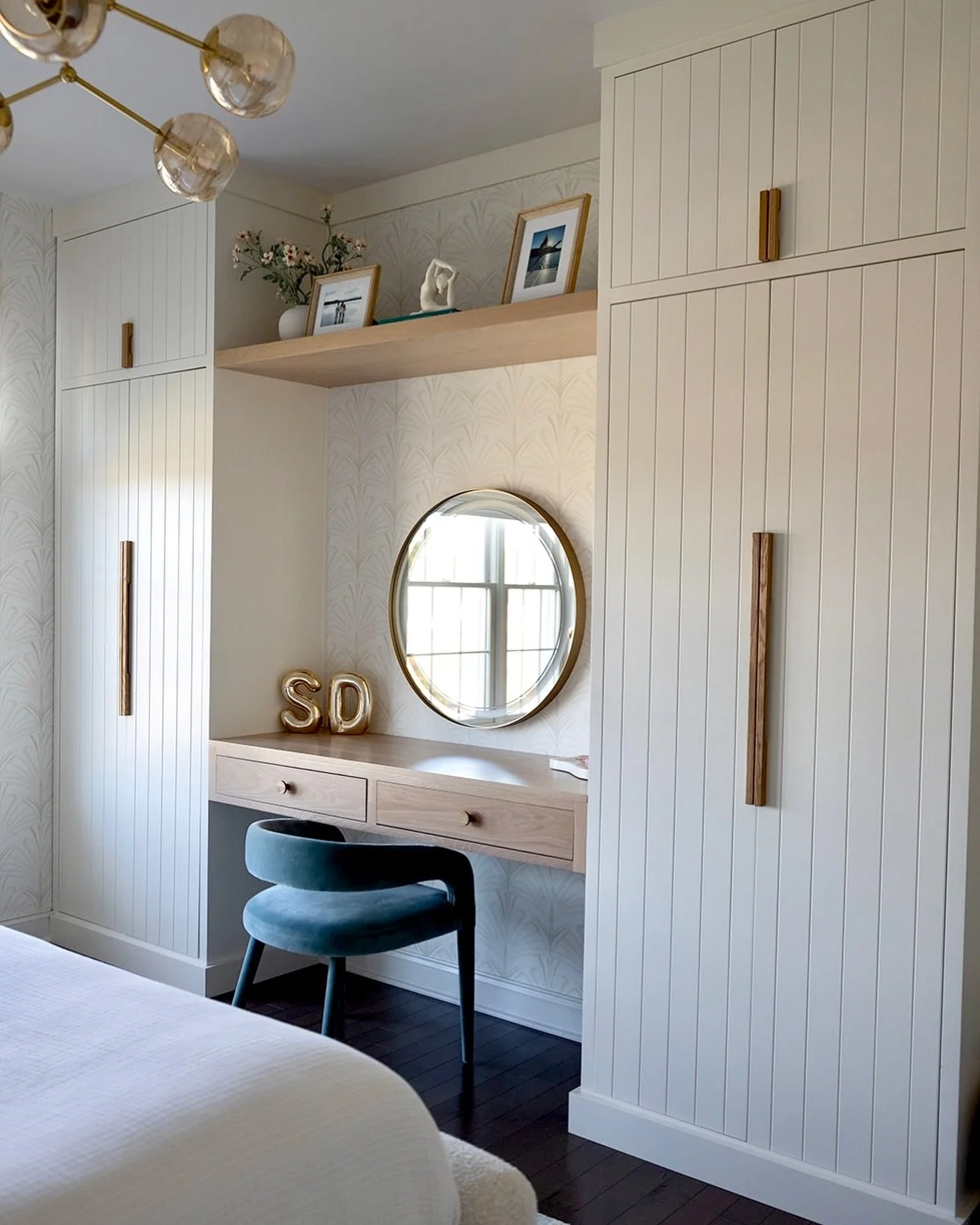 I designed this custom built in for this girls room to serve multiple functions:
1. Storage! As kids grow, they can accumulate a lot of stuff. These built ins go from floor to ceiling where storage now should never be an issue
2. Desk area! This desk