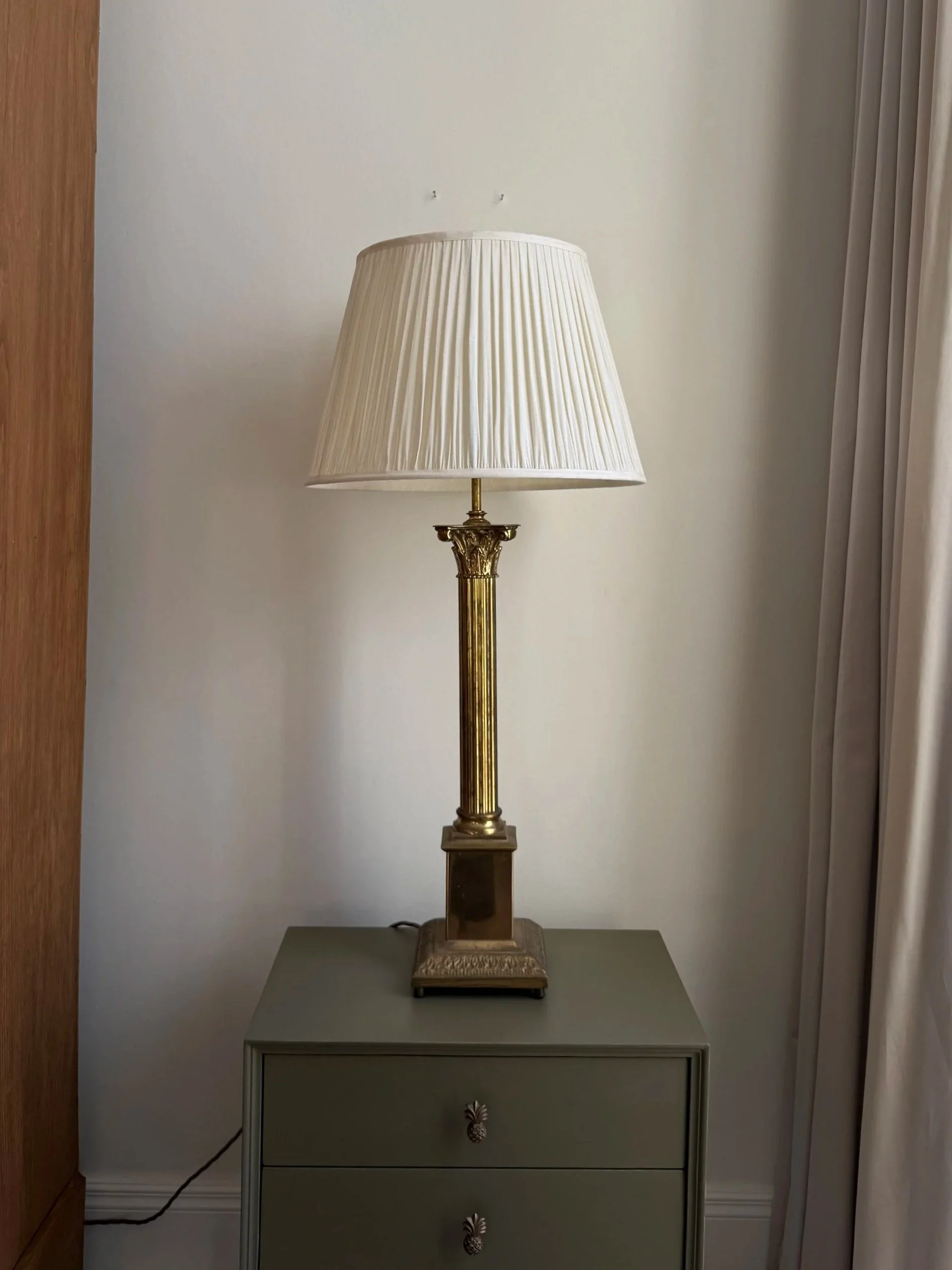 A Pair Of Corinthian Gilt Brass Lamps