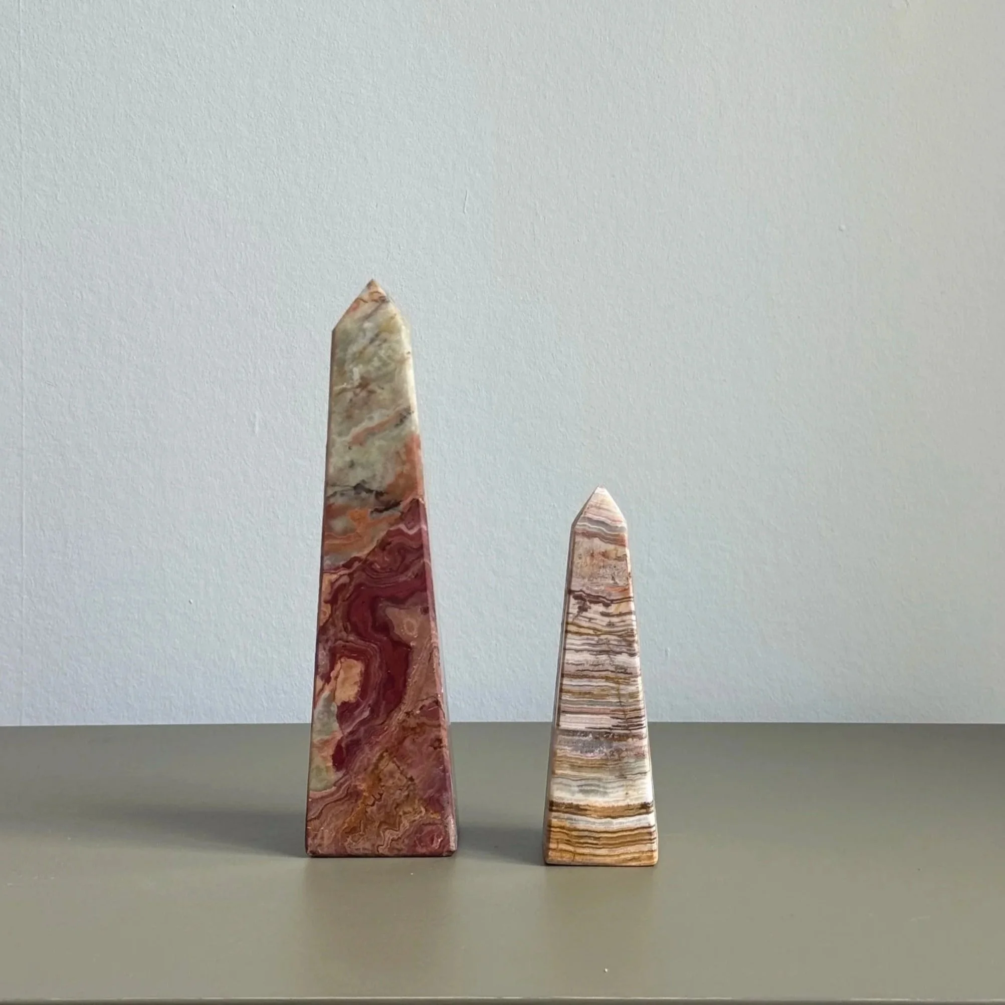 pair-banded-onyx-marble-decorative-obelisks.jpg