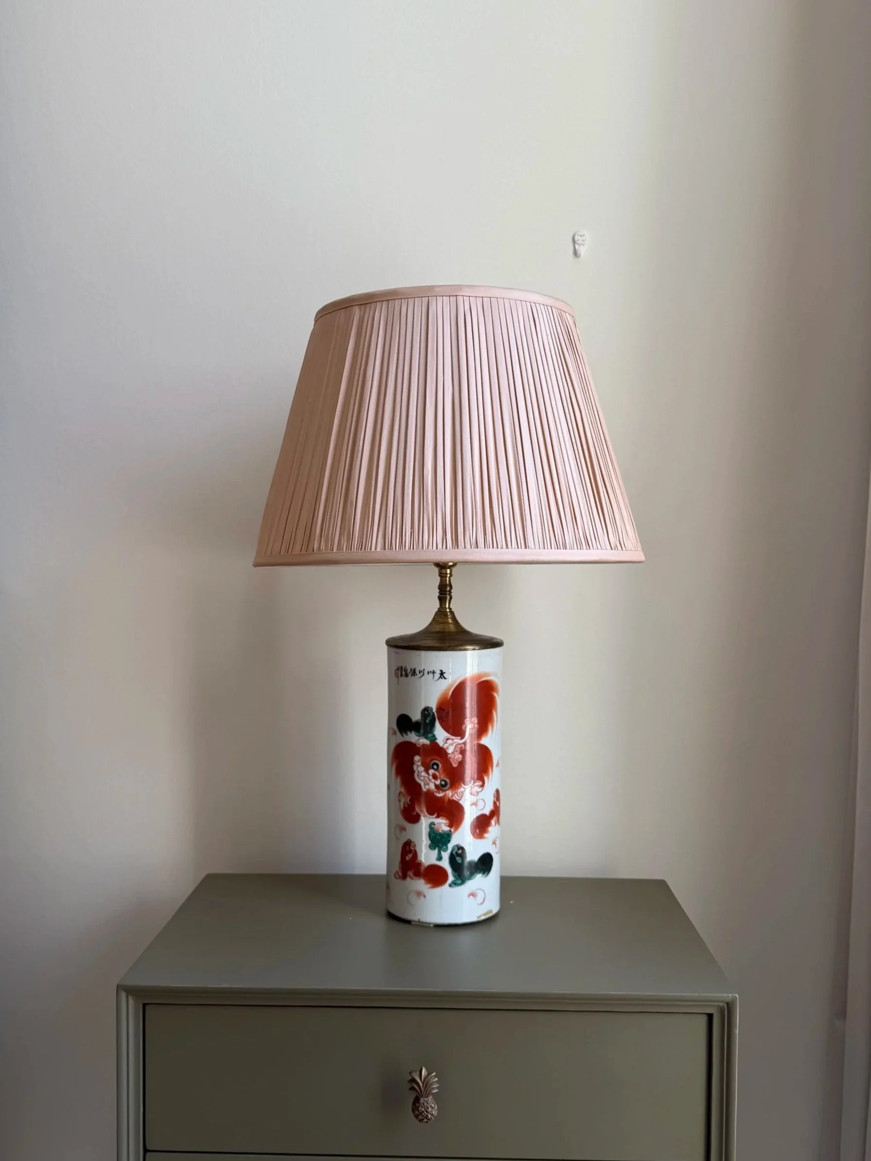Playful Porcelain Lamp With Red Lions