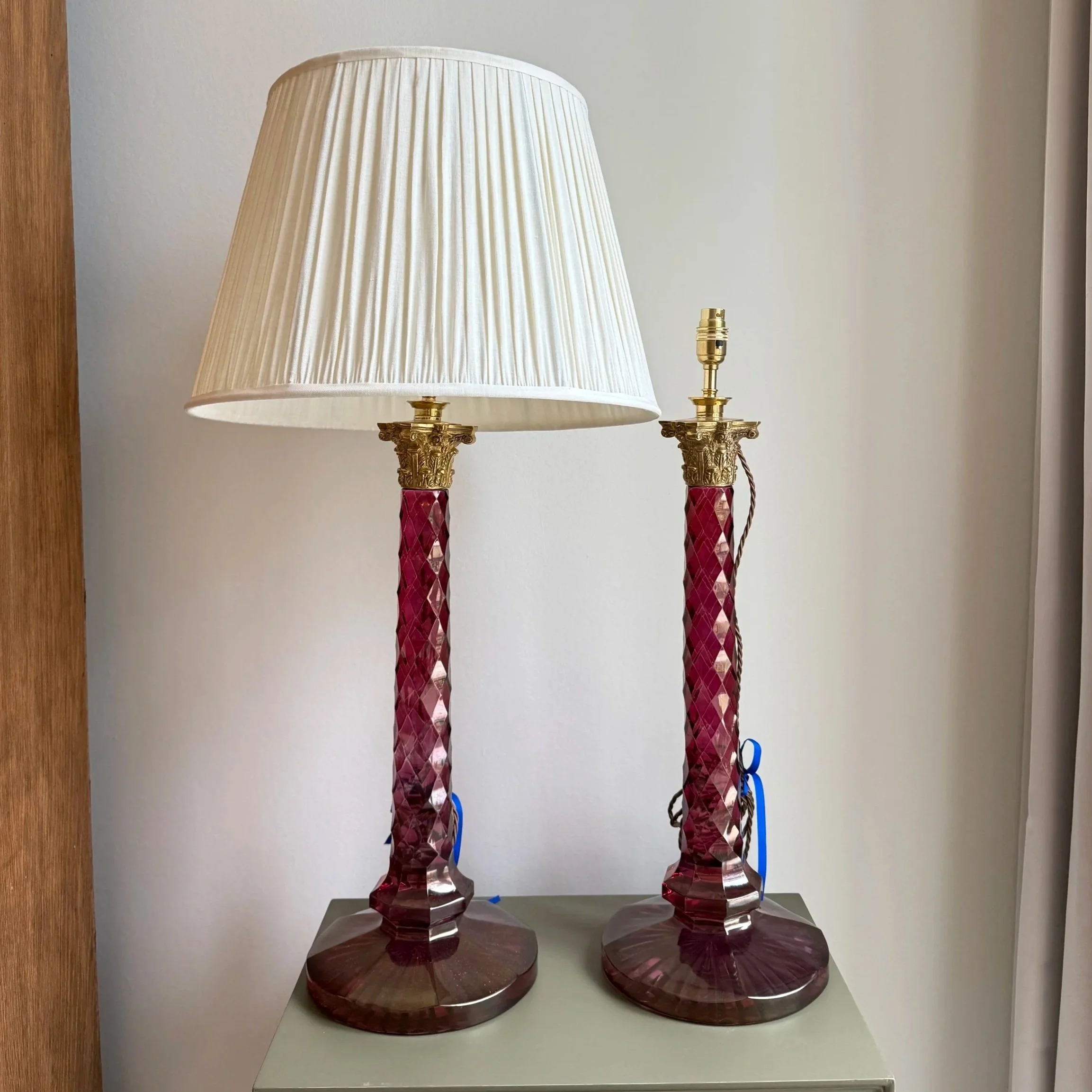 A Pair Of  Ruby Corinthian Table Lamps