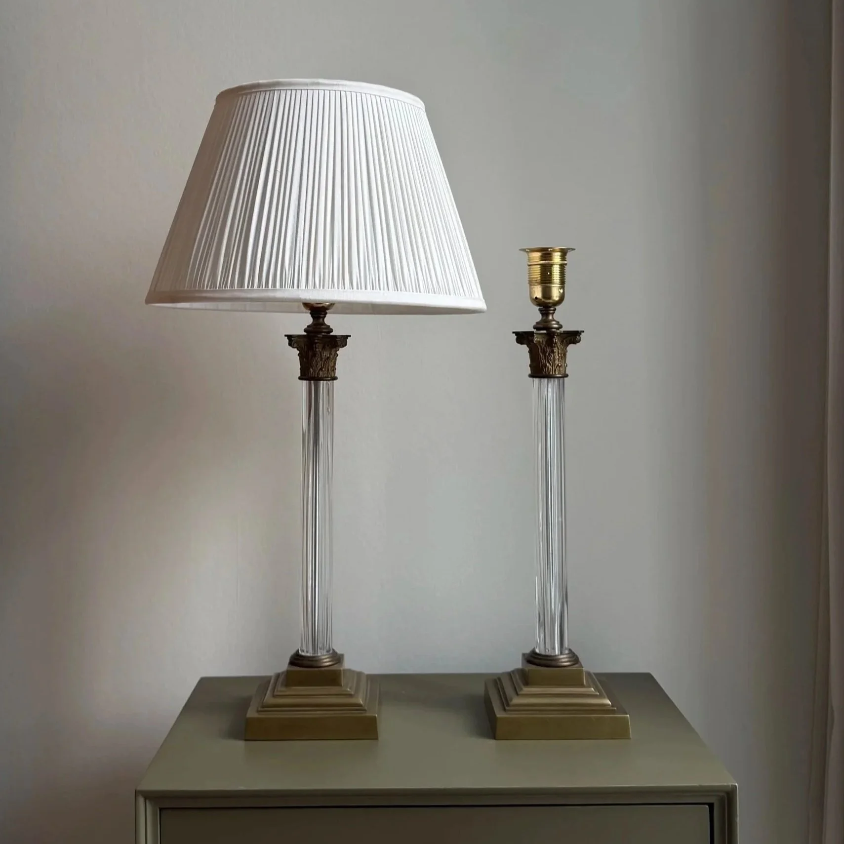 A Pair Of Corinthian Glass Lamps