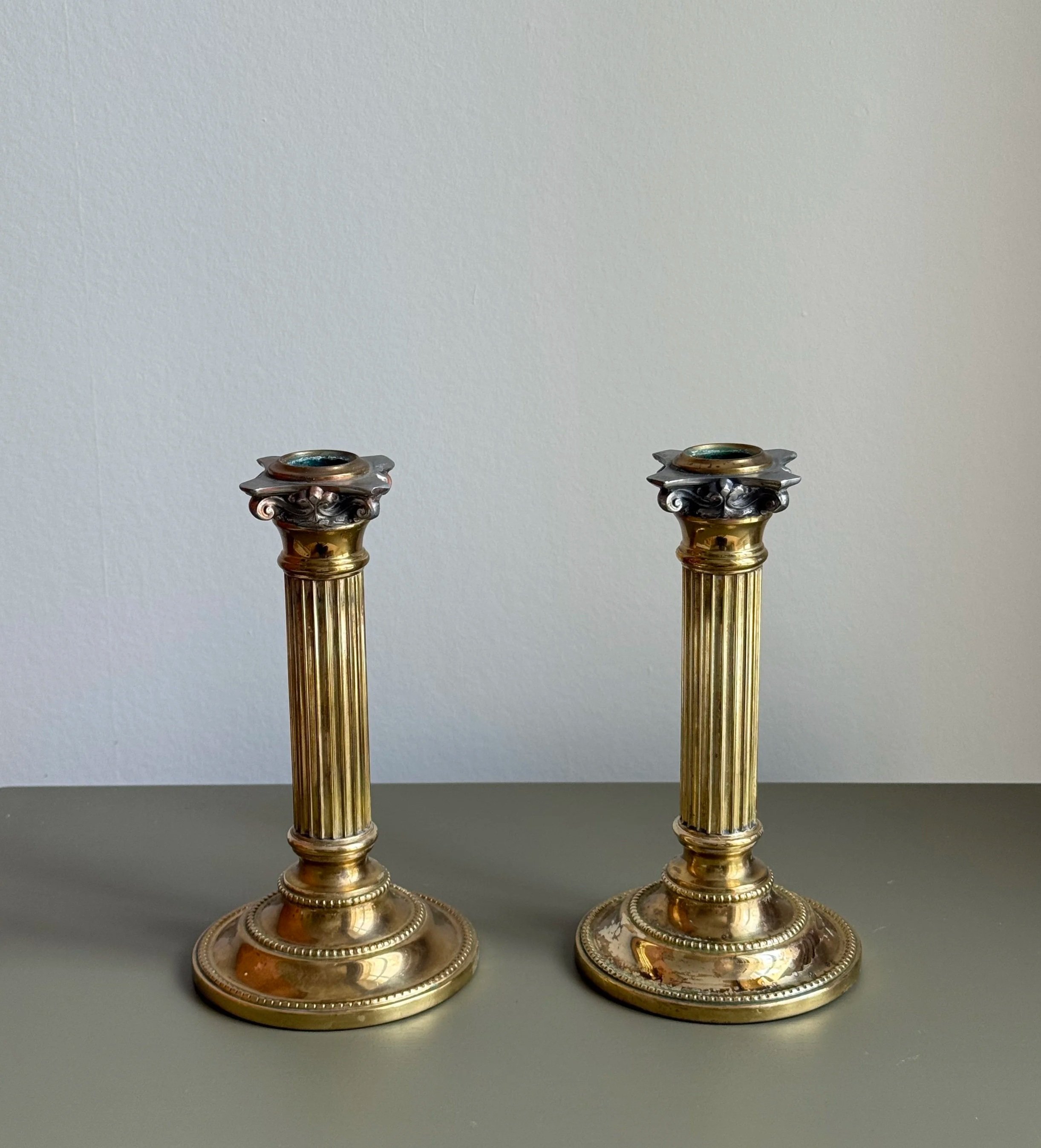 A Pair Of Column Candle Holders