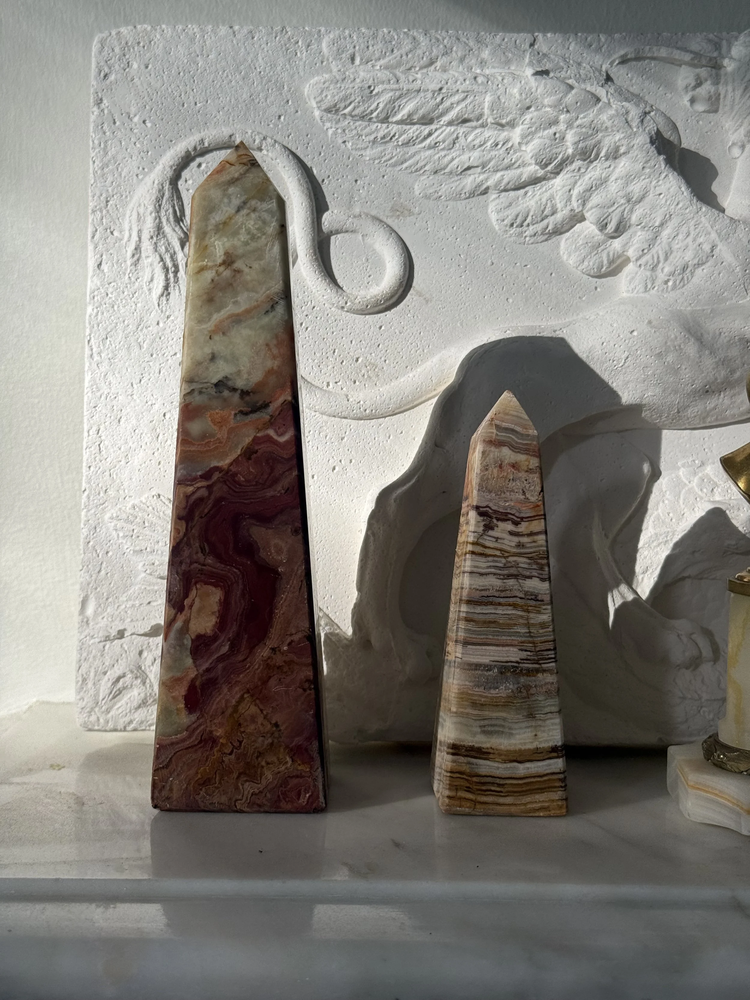 pair-banded-onyx-marble-decorative-obelisks.jpg