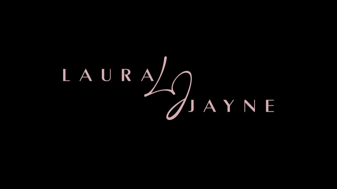 The logo features the salon name 'Laura Jayne' with a stylized 'L' and 'J' in a soft pink that connects the two names on a black background.