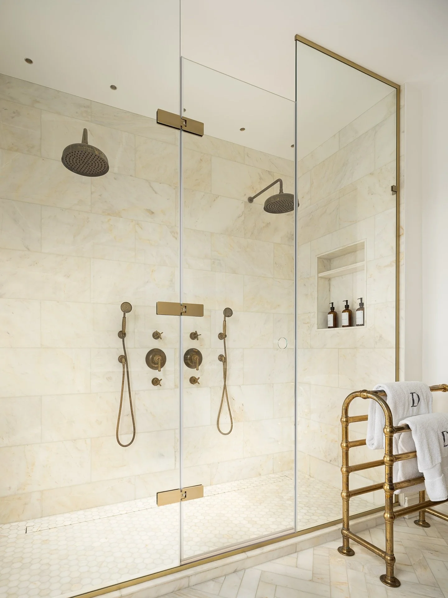 Parsons Green House

A serene double shower retreat wrapped in warm honed marble, brass accents, and balanced symmetry. Soft curves meet tailored detailing, creating a principal en suite that feels both timeless and quietly indulgent.

📍Parsons Gree