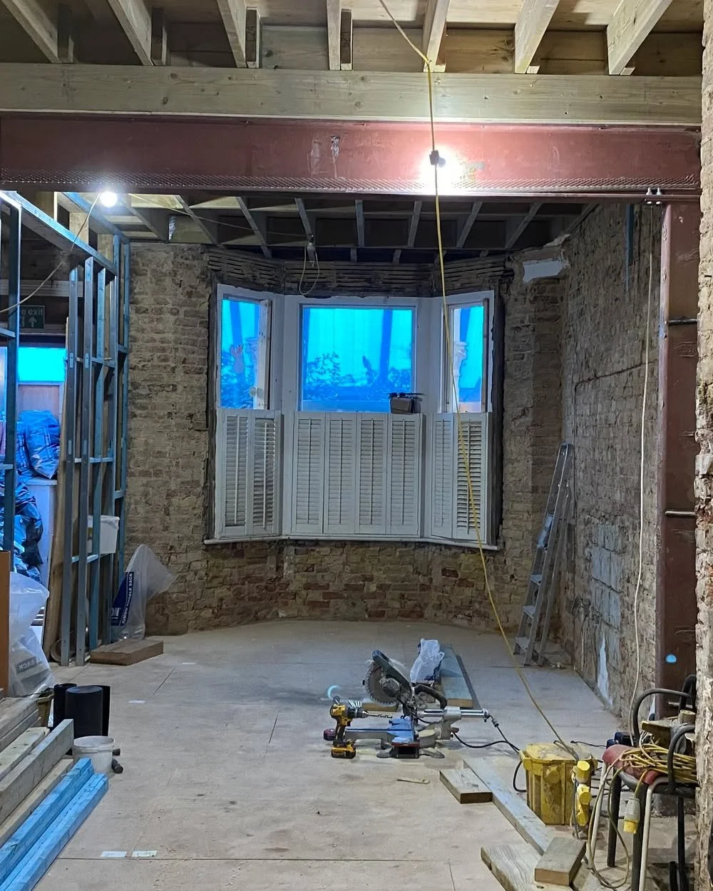 Parsons Green House | Before and after 

The reception was functional but forgettable &mdash; standard proportions, no spatial drama, surfaces that said nothing about how the home wanted to feel.

Our intervention: full-height panelling to create ver