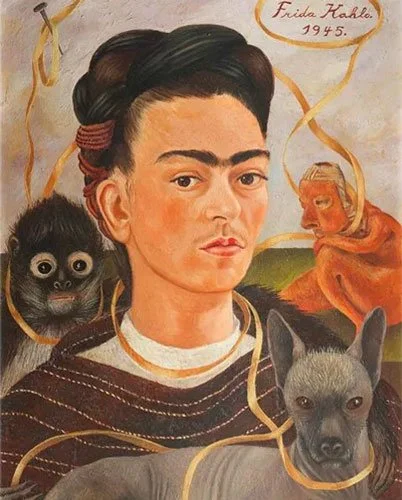 Kahlo's 1945 self-portrait showing her face framed by a spider monkey, a second monkey, and a hairless Xolo dog, connected by a gold ribbon.
