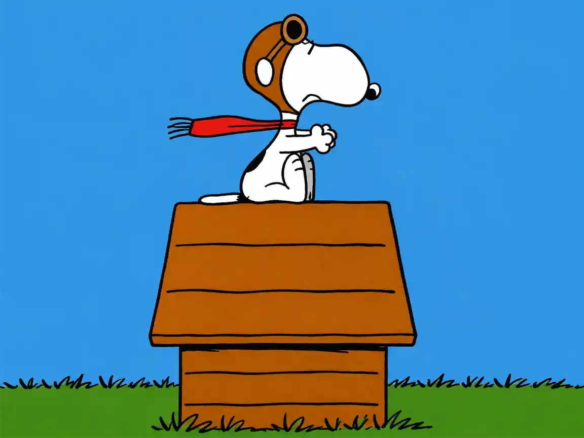 Cartoon of a white beagle in a brown leather aviator helmet, goggles and a red scarf, sitting atop a brown doghouse roof against a blue sky, one paw raised as if gripping a control stick.