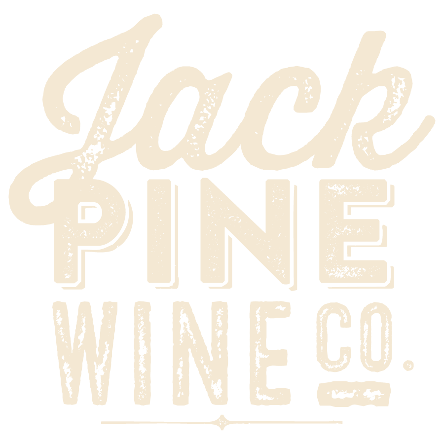 Text graphic that says "Jack Pine Wine Co." with a vintage style font.