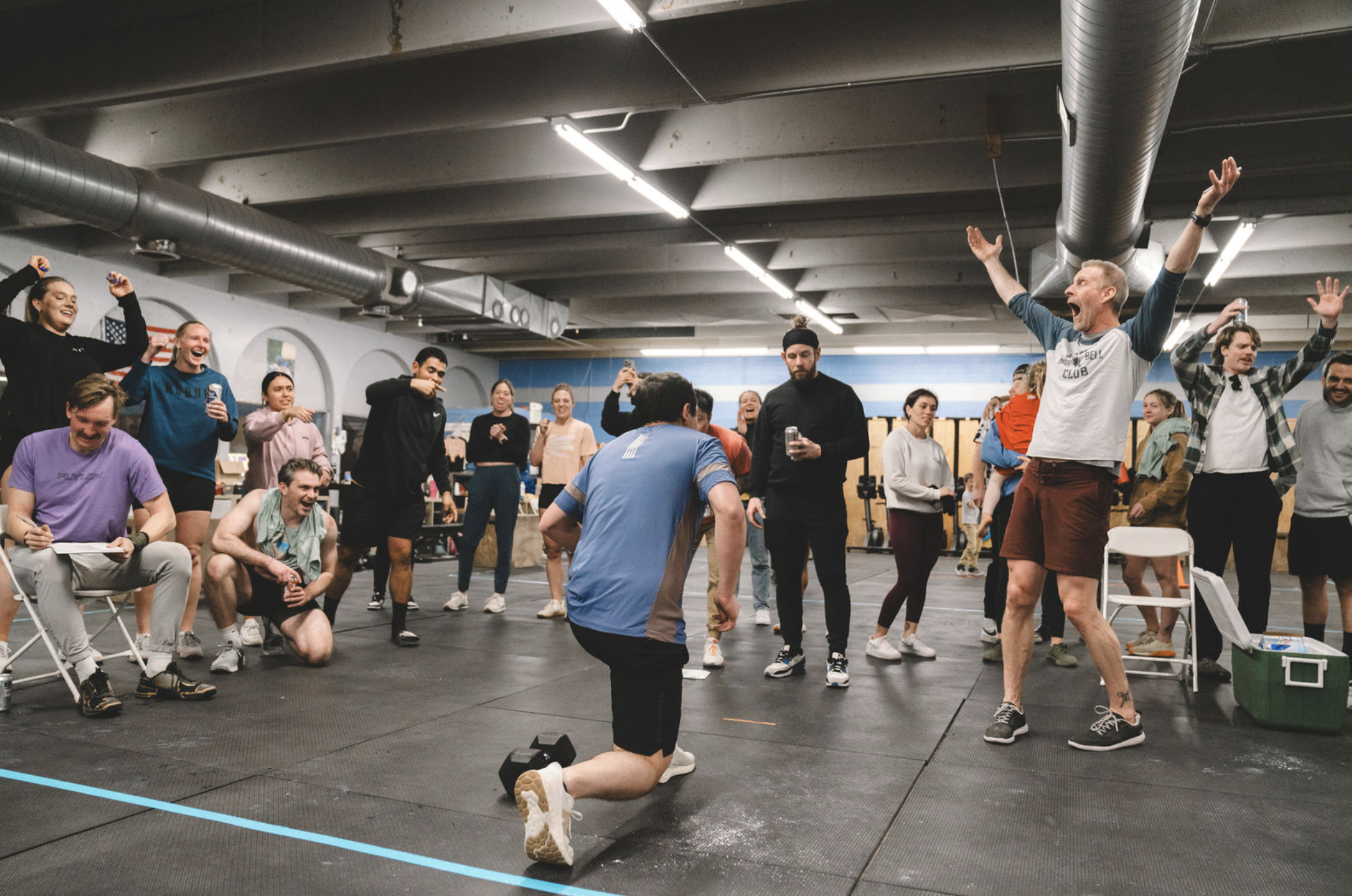 CrossFit Wash Park athletes cheering during an event at the current Evans gym.