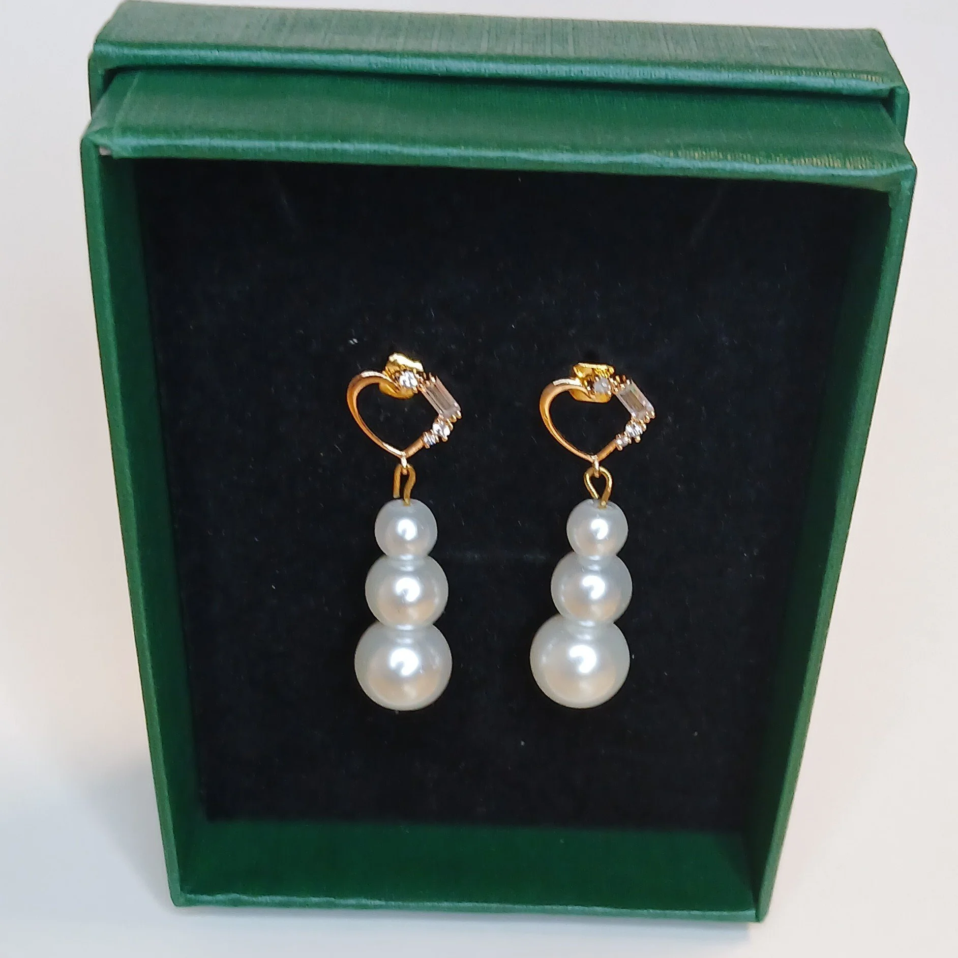 Three Pearl Earrings.jpg