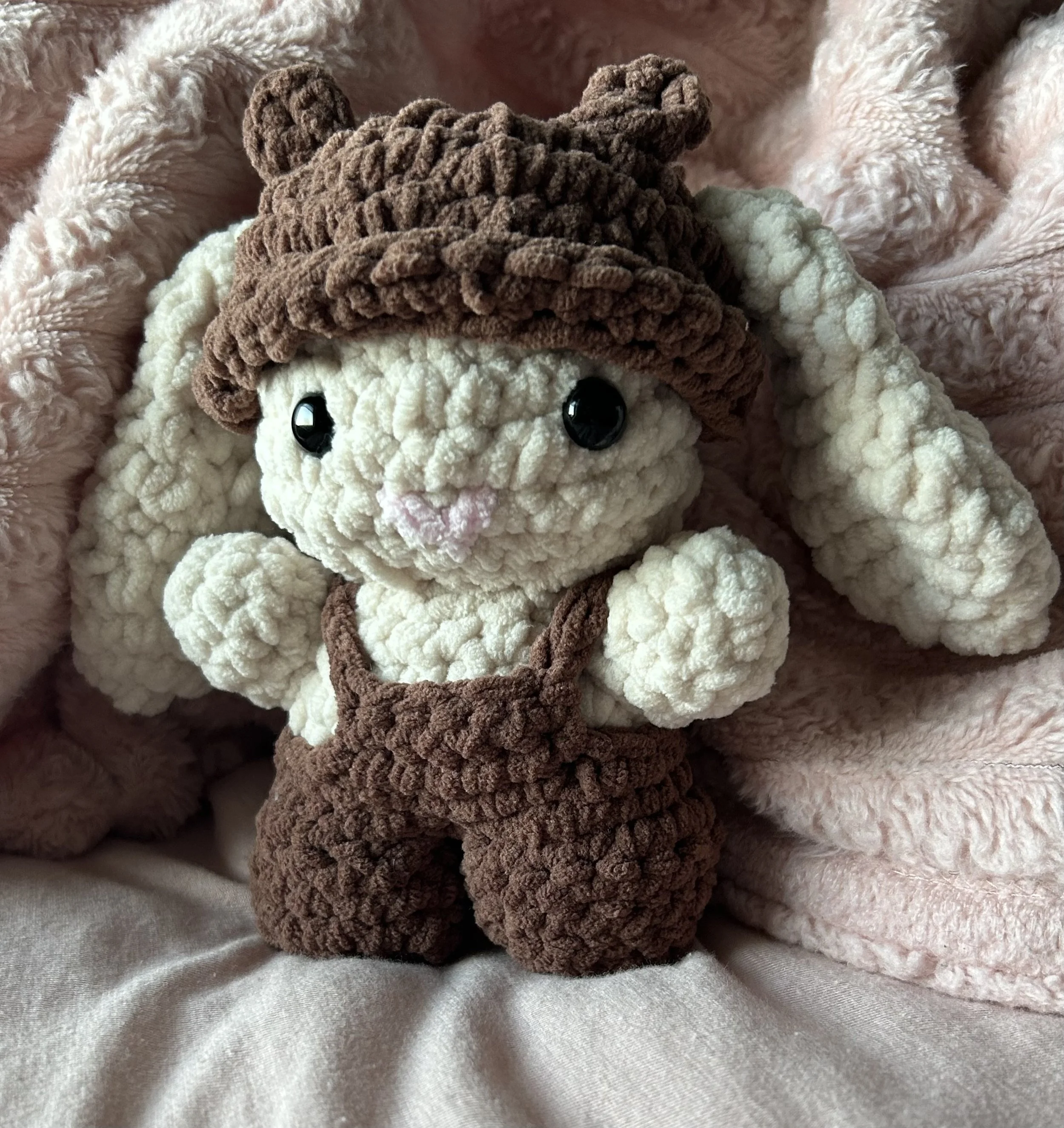 Bunny with overalls and bear hat.jpeg