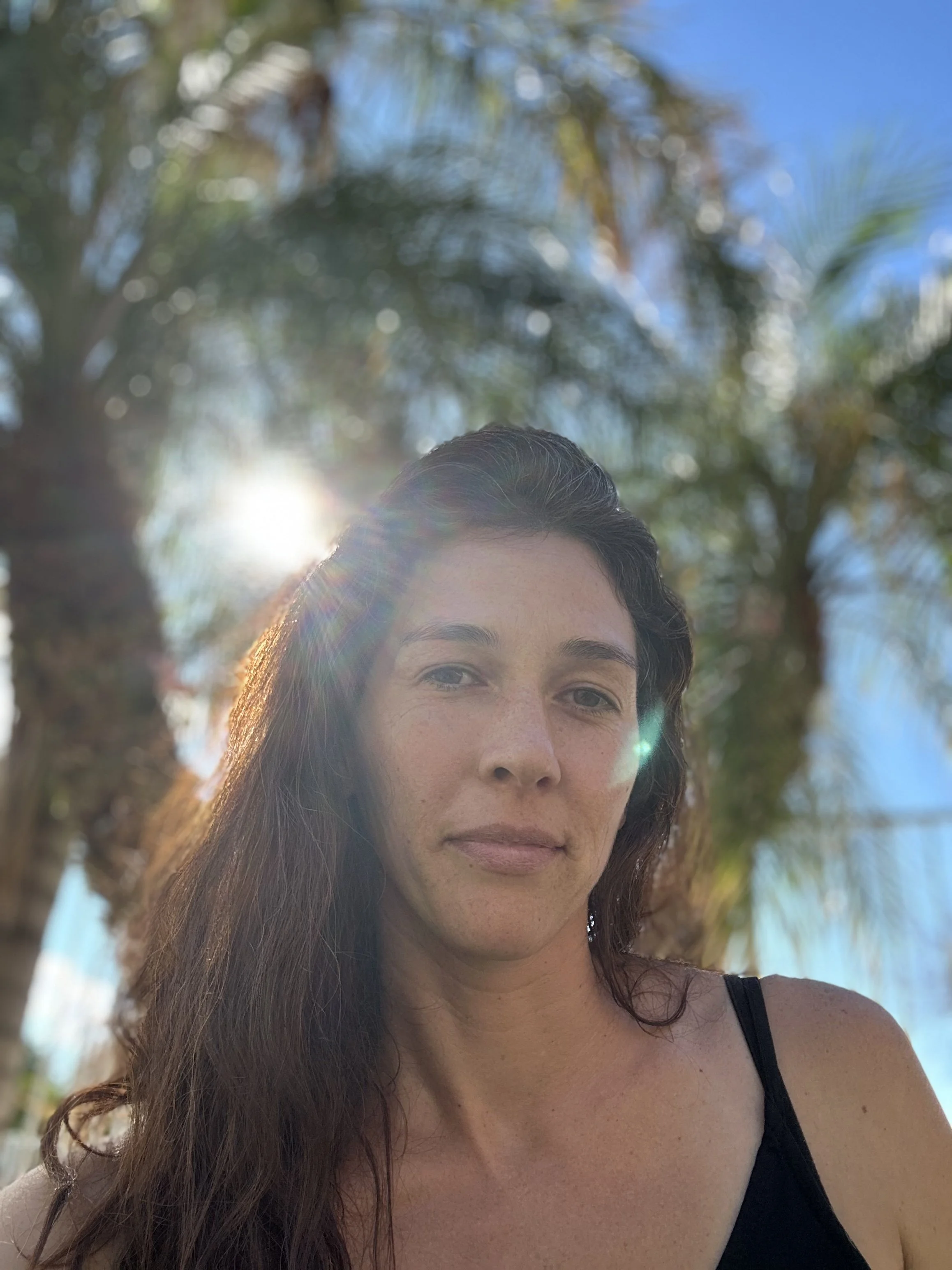 Mariah Rozinski, life coach and financial coach helping clients with healing, personal growth, creating stability, reducing overwhelm, and build extraordinary lives.