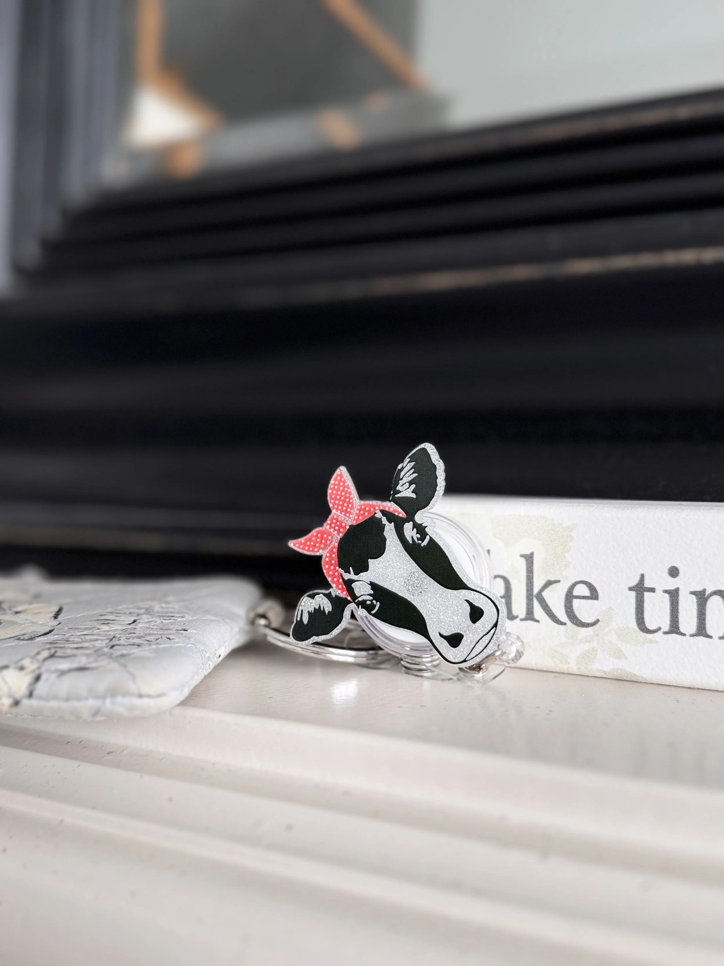RETRO COW BADGE REEL