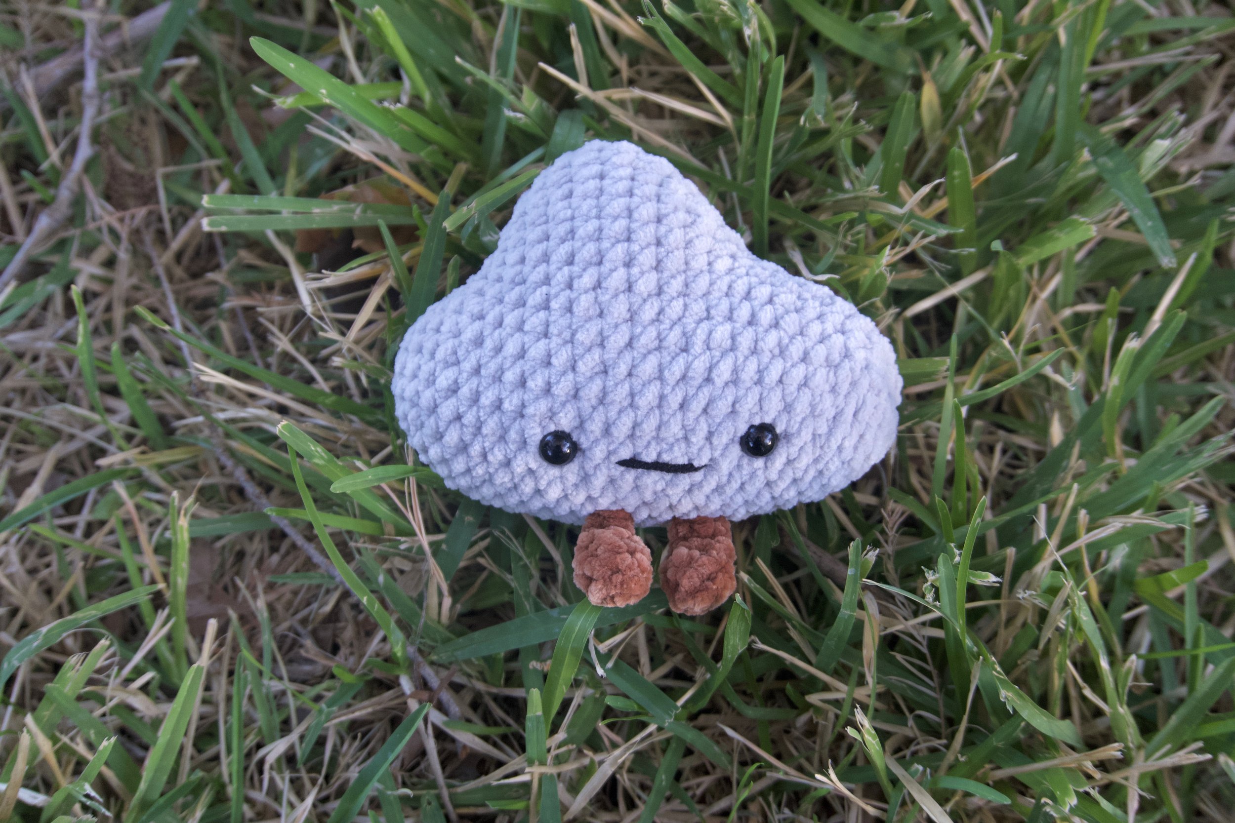 cloud jellycat on grass.jpeg