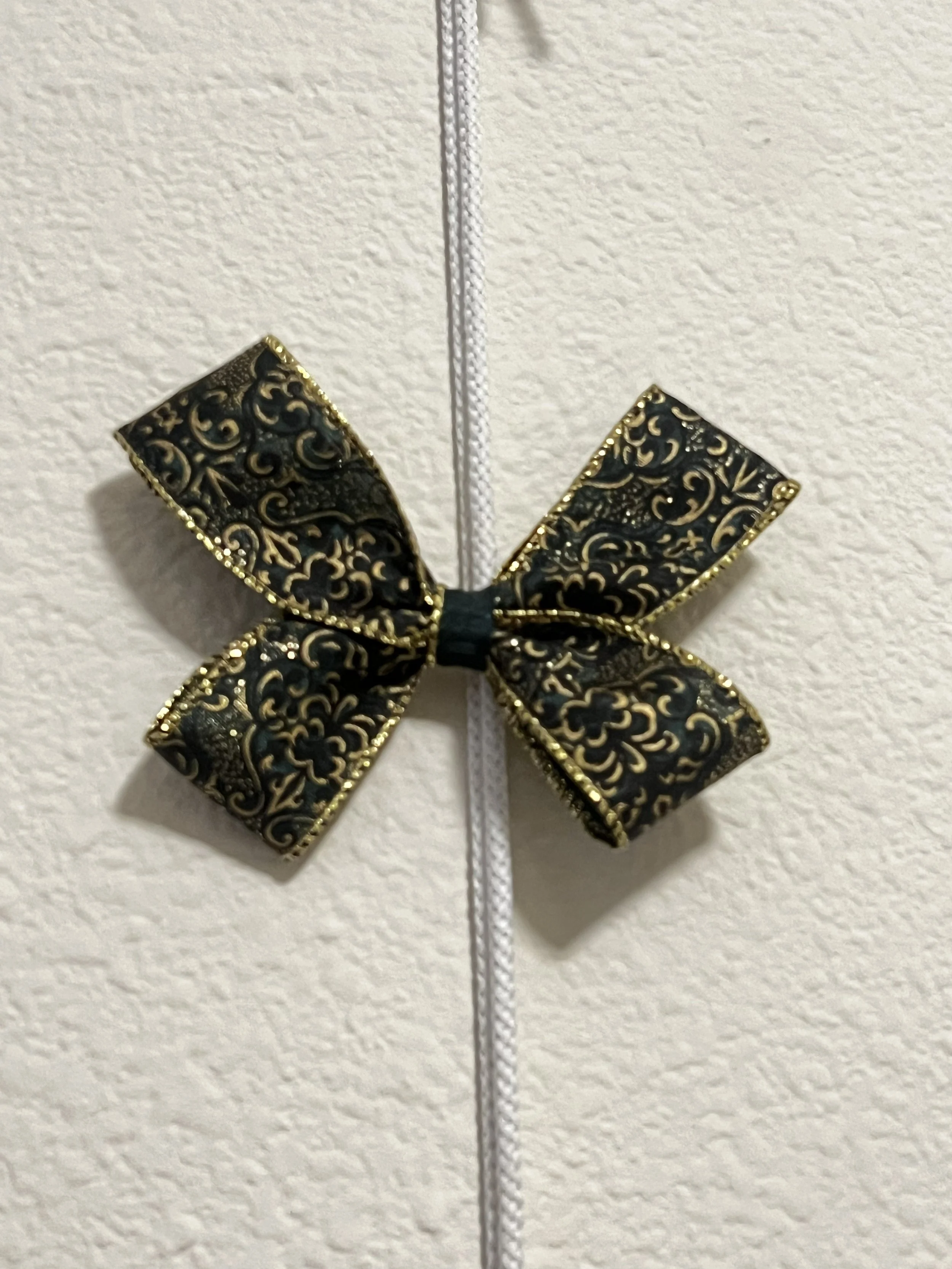 Emerald and Gold Butterfly Bow.jpeg