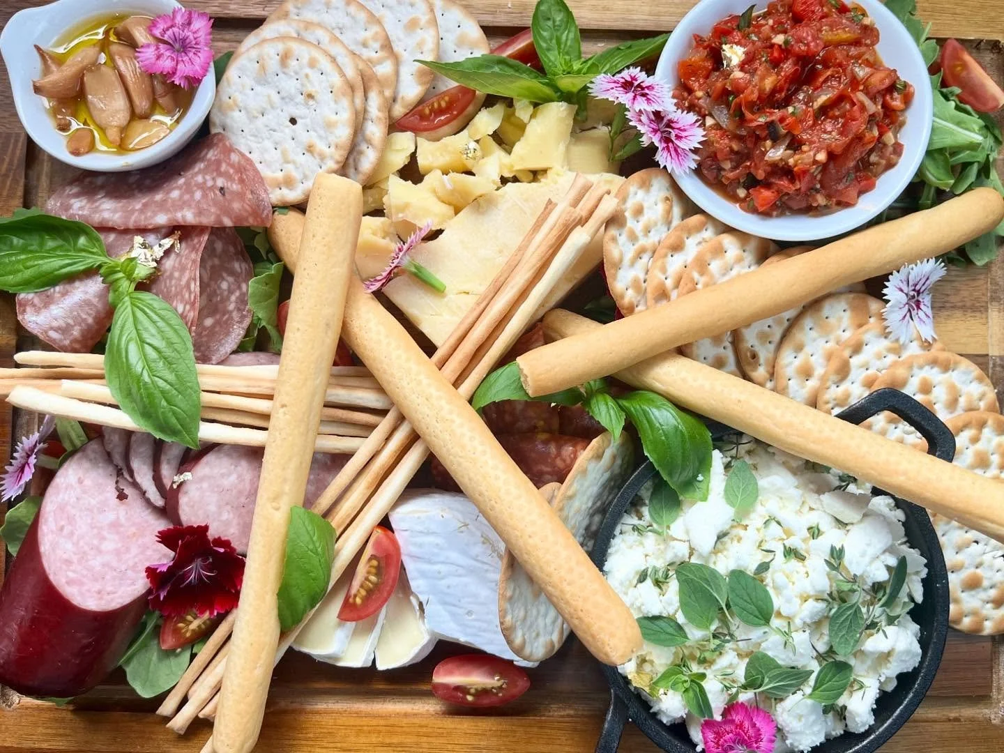Someone say Sunday gathering? Our charcuterie add on service is a crowd pleaser. The brie-lliance of our boards go unmatched.