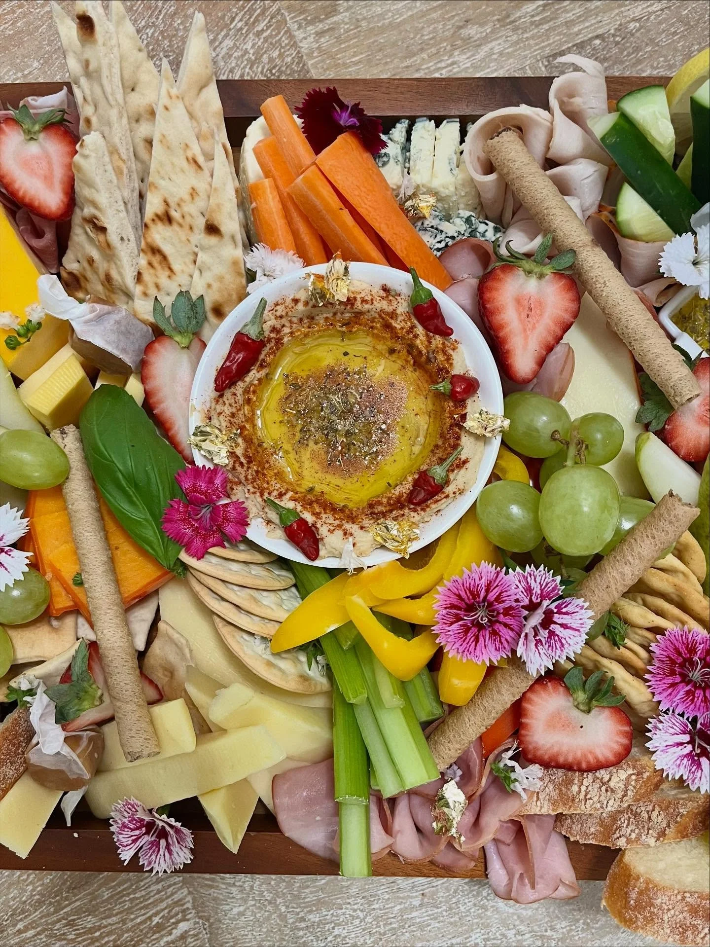 Something for everyone! Quality ingredients, careful preparation, and creative presentation. This board was a special request board with sweets and savoury items. Choose from our many themes (eg. antipasto, Mediterranean mezze, brunch, picnic, or des