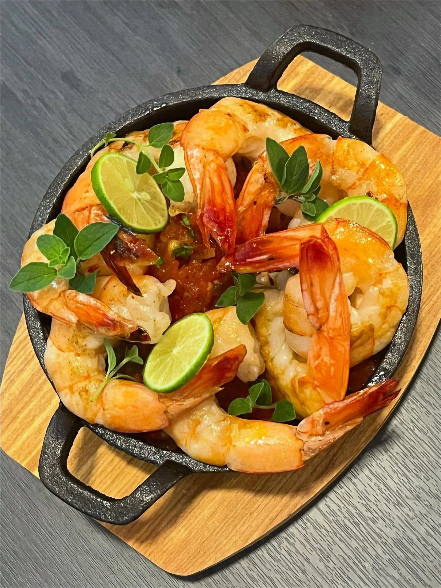 Herb brined and then pan seared local Jacksonville Mayport shrimp over a roasted spicy red chutney served with fresh herbs and key lime 🍋&zwj;🟩 🦐 🍅 🌶️ 

Even though we&rsquo;re in Florida and we&rsquo;re not fighting the brutal winters the rest 