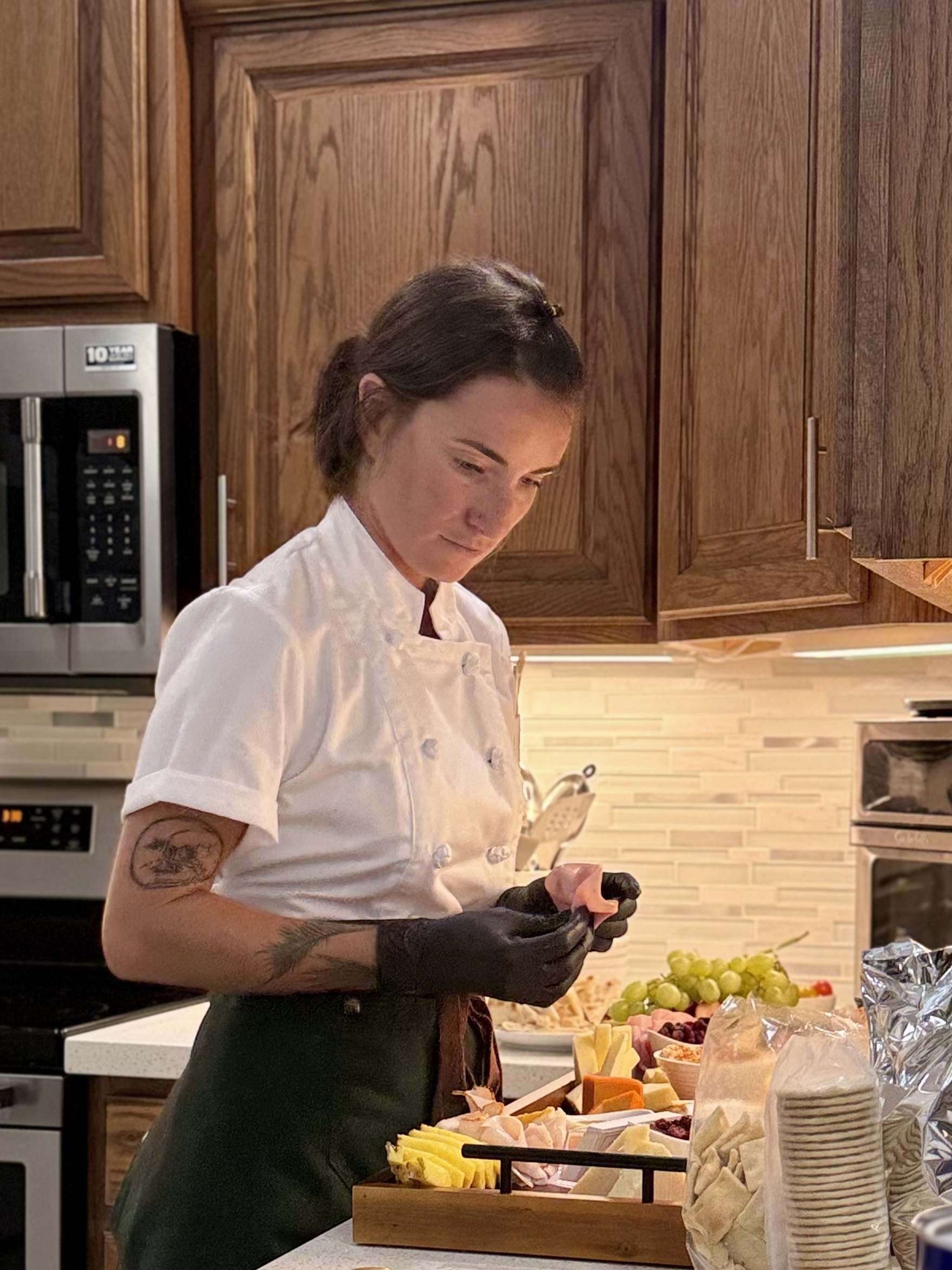 Chef Sam assembling a Charcuterie