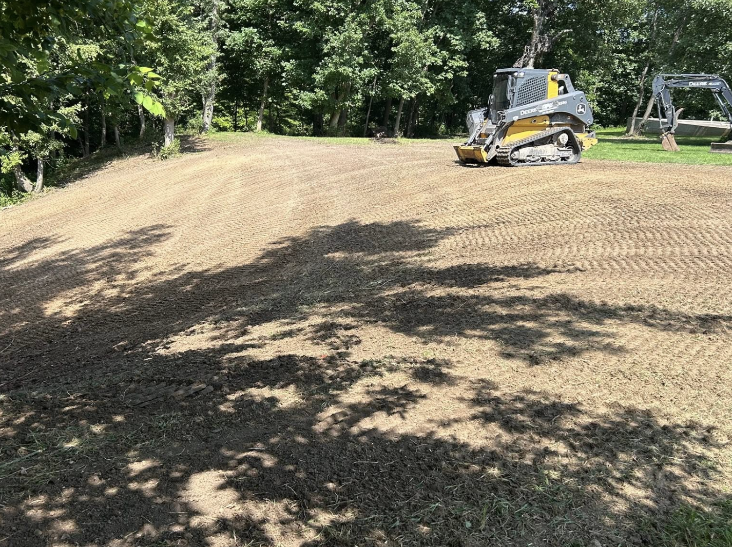 Gravel driveway installation with precision grading completed in Oglesby, IL.