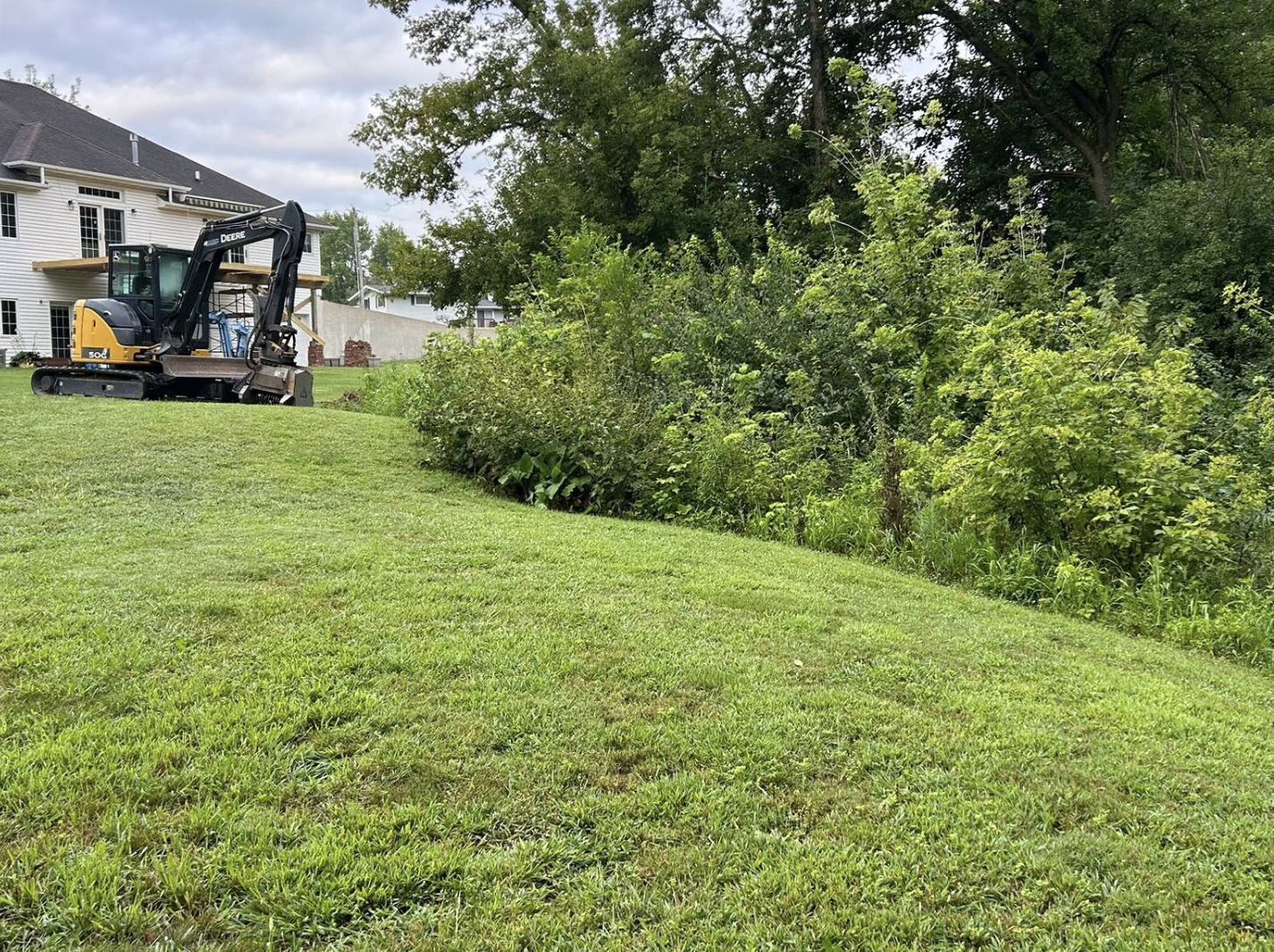 Forestry mulching services completed to clear overgrown land in La Salle, IL.