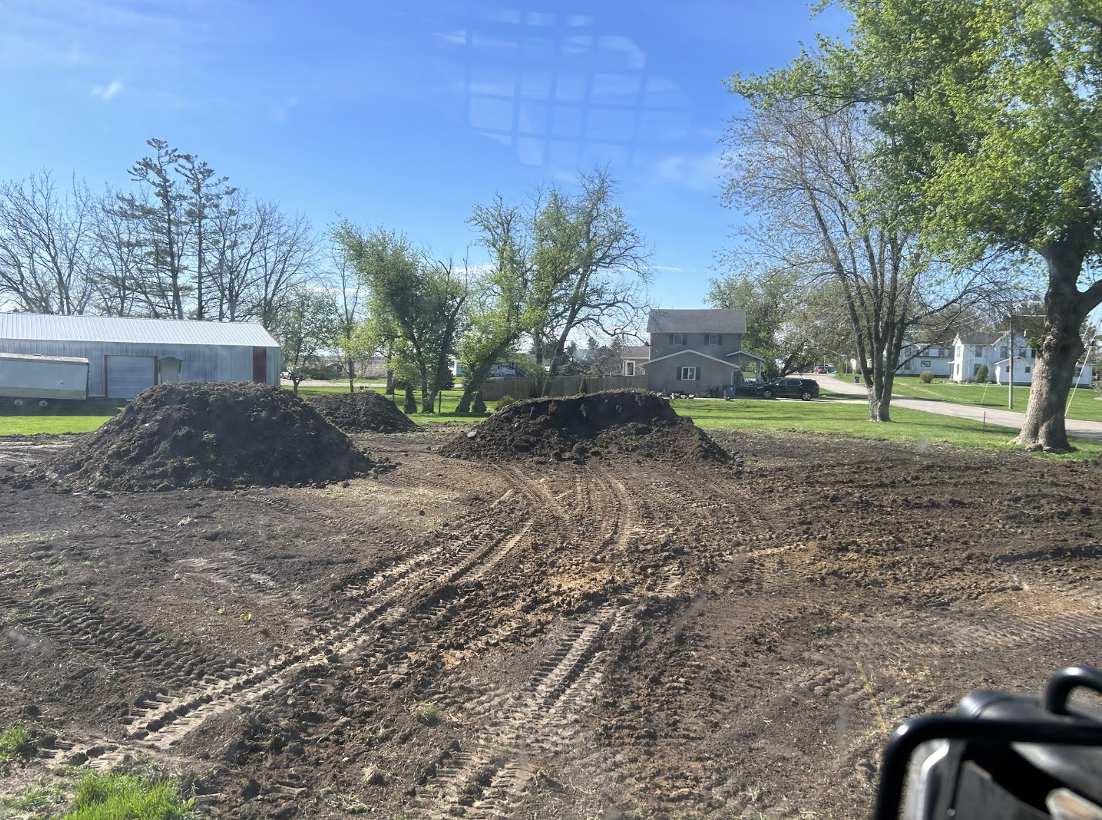Wooded lot clearing services completed in Mendota, Illinois.