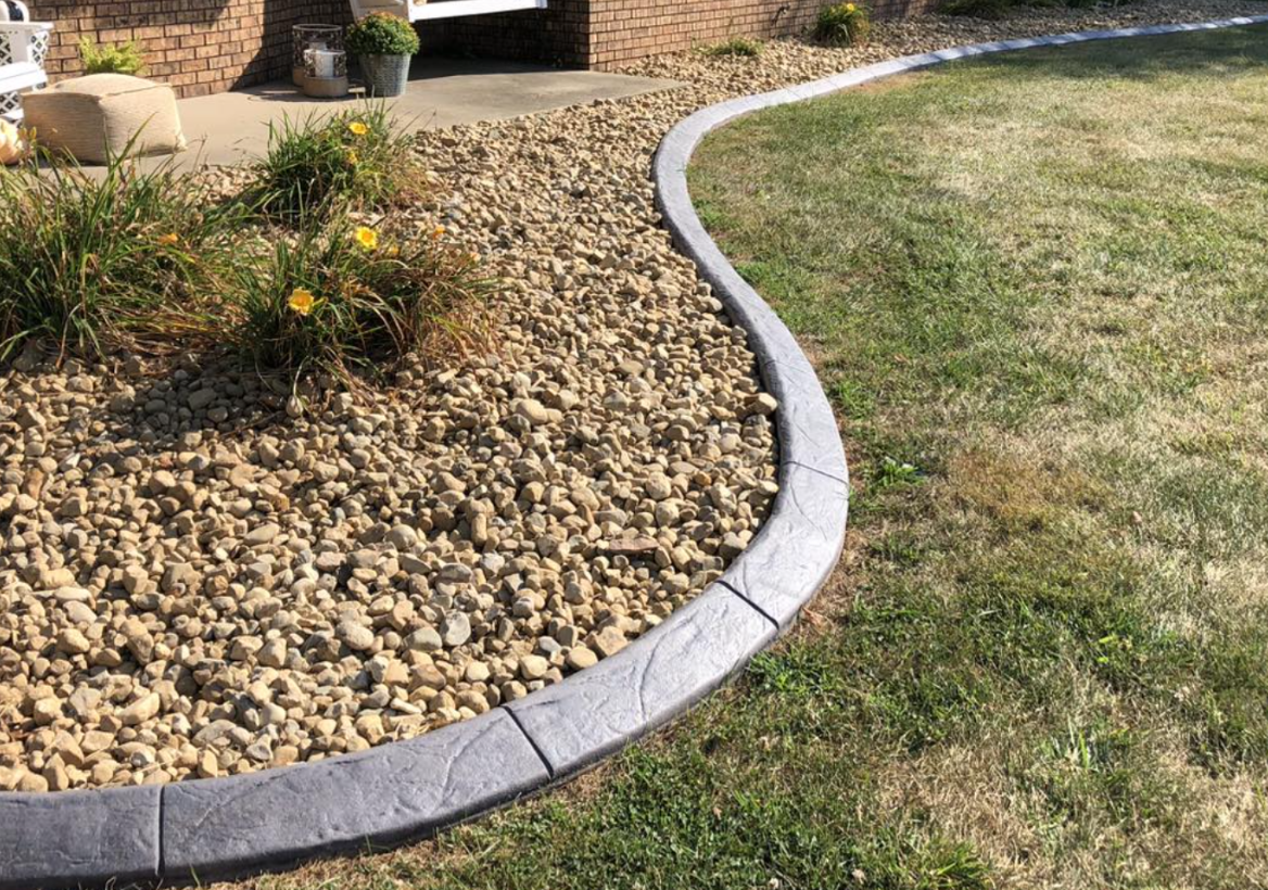 Decorative concrete curbing installed in Peru, Illinois.