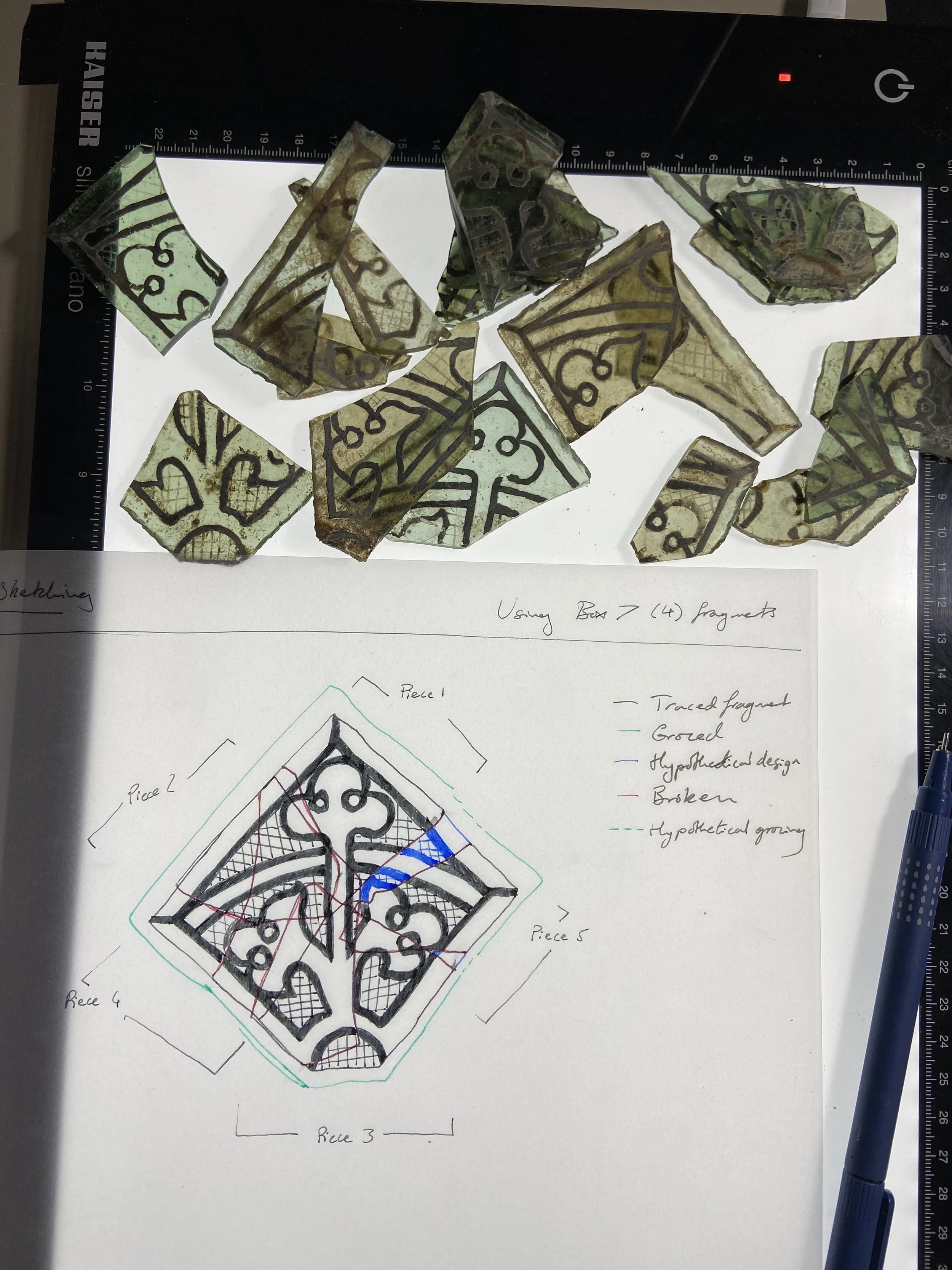 Reconstruction of designs from the fragments