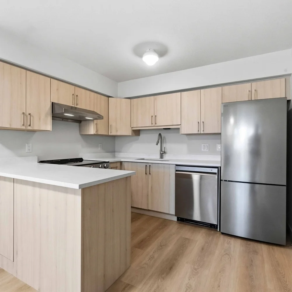 Renovated kitchen in home 305 with stainless appliances