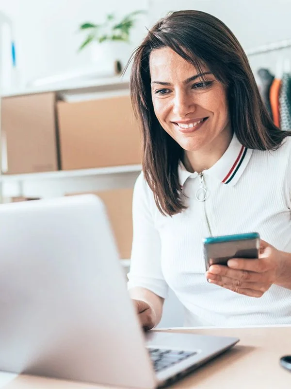 Business owner getting an online quote for business insurance in Redding