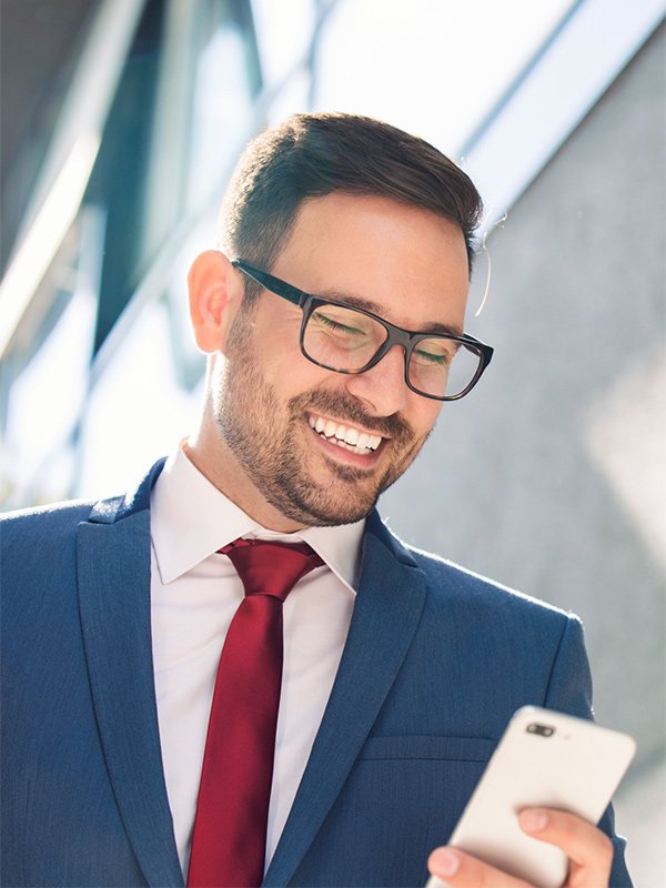 Small business owner on phone receiving online quote for income insurance