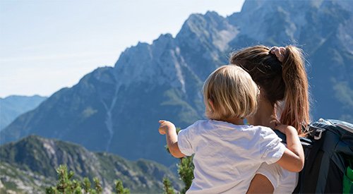 Woman and child on hike covered by life insurance with Farmers Insurance Agent