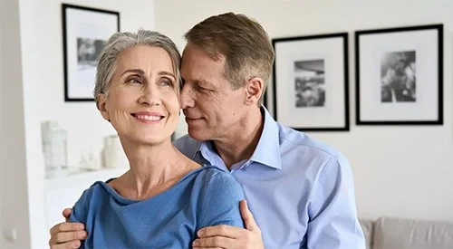 Older couple covered by whole life insurance plan with Farmers Insurance Agent