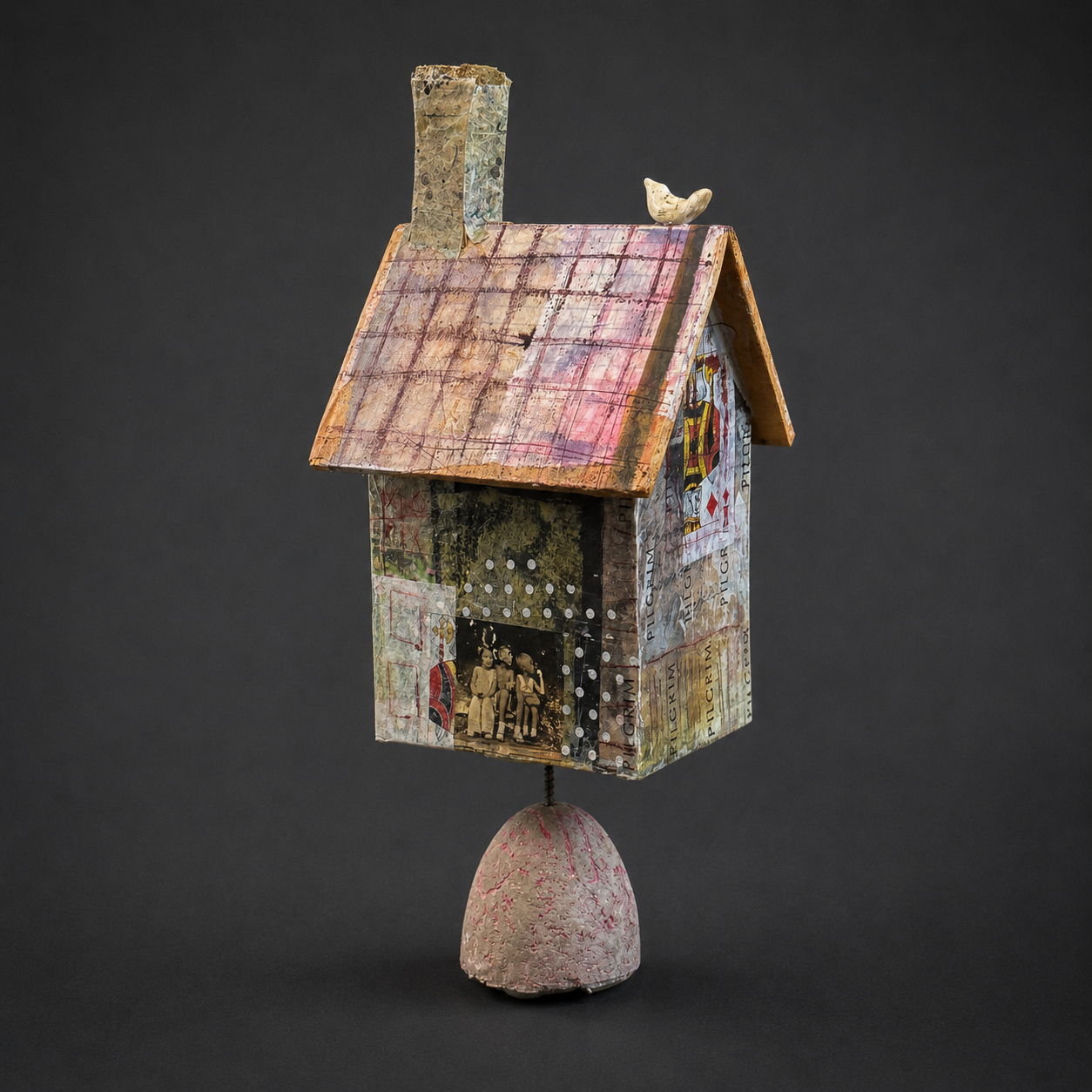 'Pilgrims Blowing Bubbles', assemblage with board, beeswax, pigments and tissue paper on a hypertufa base, 2026