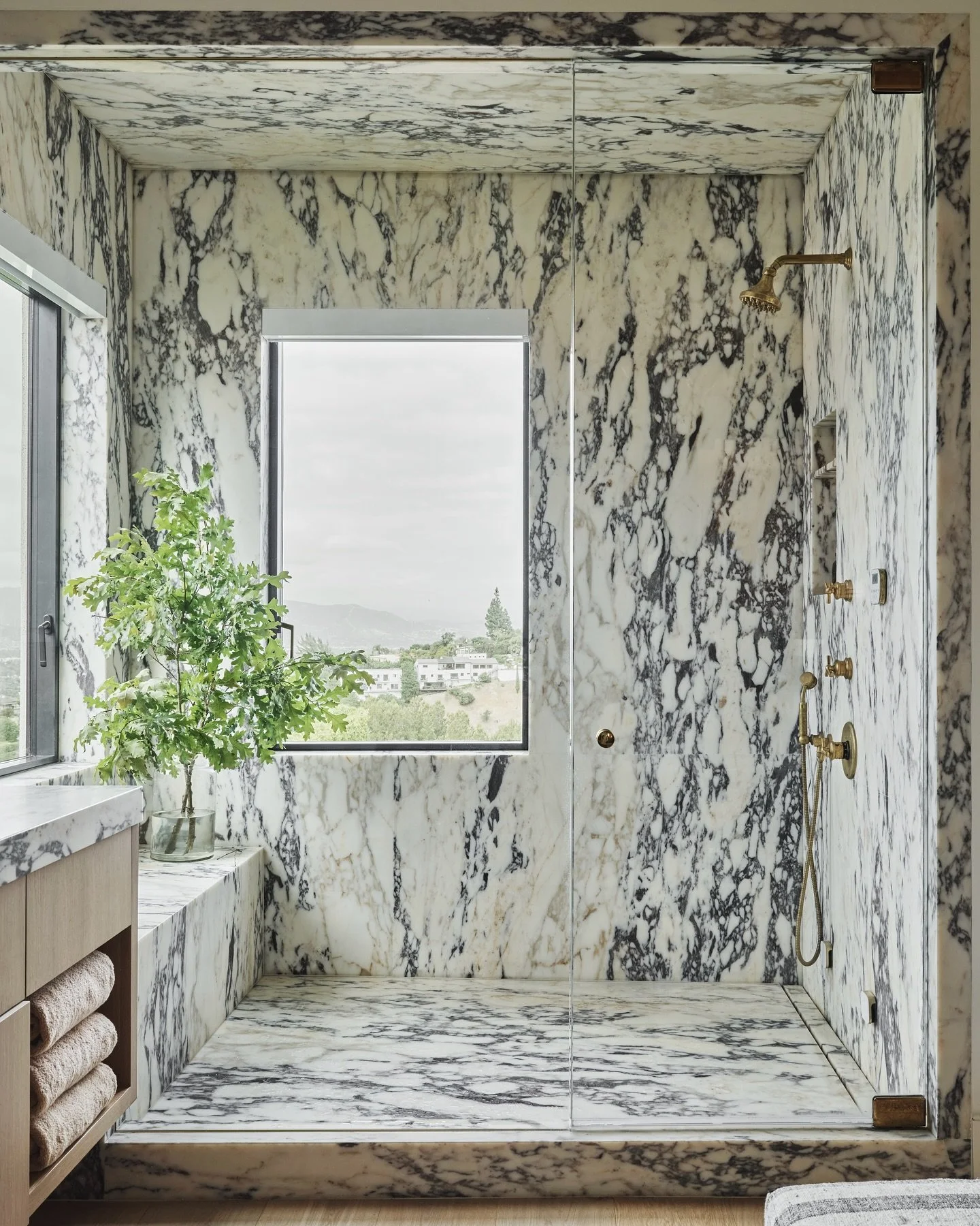 An emphasis on statement but timeless materials and finishes in our Clerendon Residence. The use of multiple unique stone slabs juxtaposed with soft, light upholstery and an airy color palette throughout the home make for a feminine yet modern design