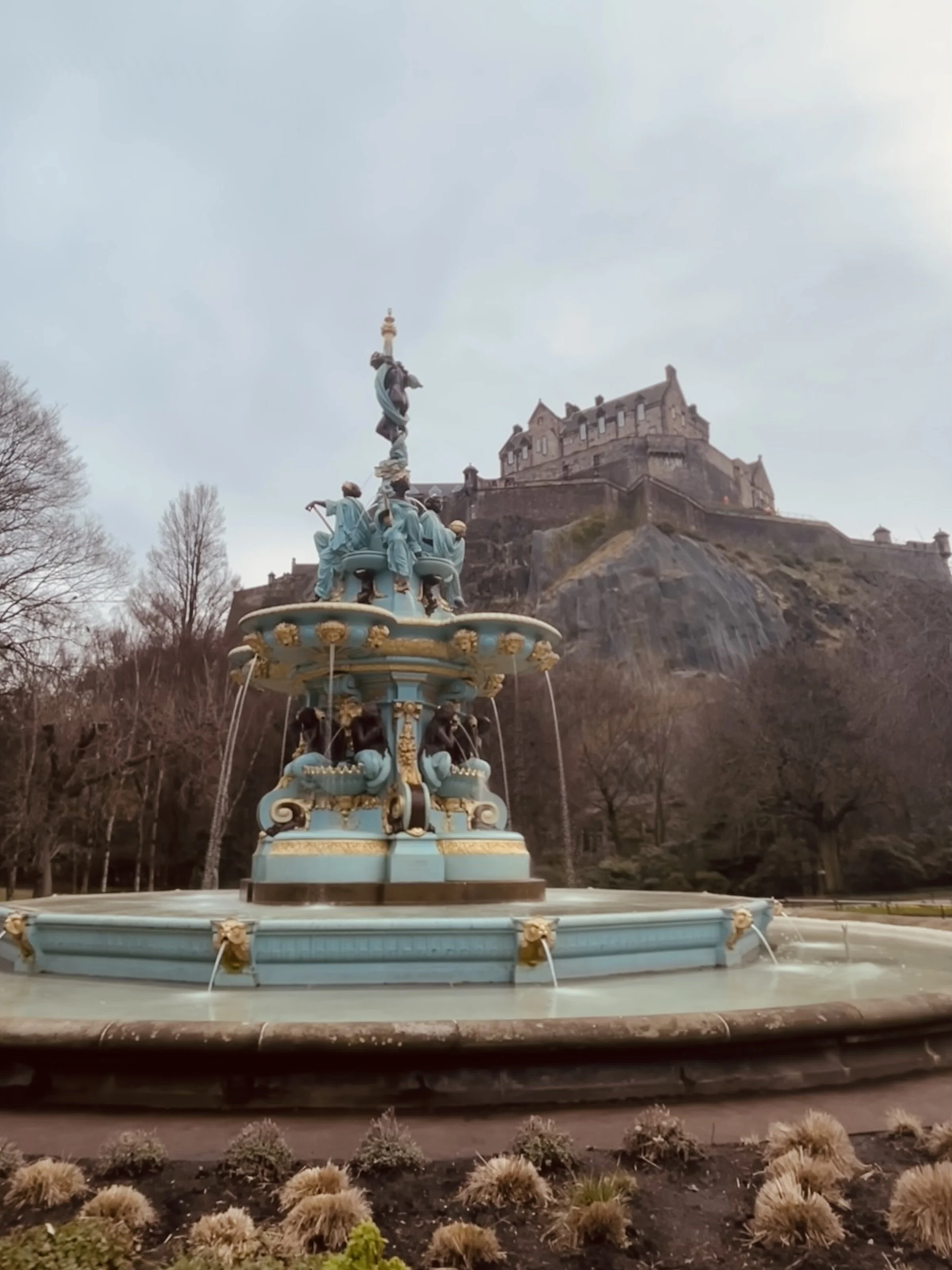 Ross Fountain in Princes Street Gardens with view of Edinburgh Castle