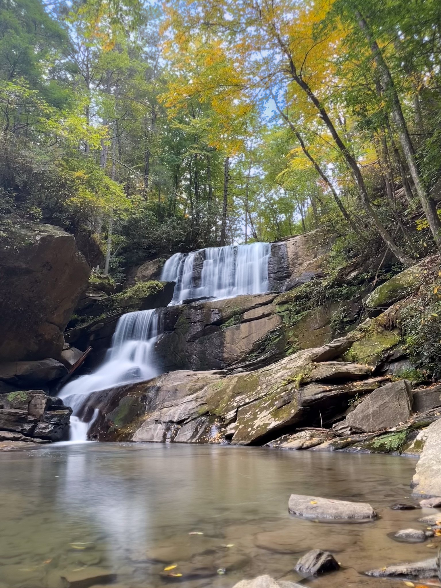 Lower Bradley Falls in Saluda NC surrounded by early fall foliage