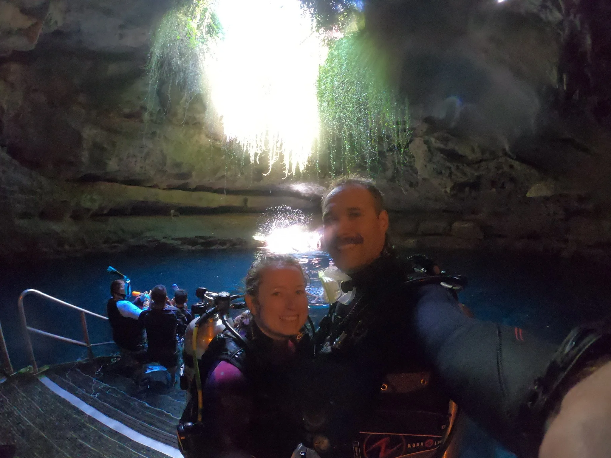 author and husband inside devils den cavern