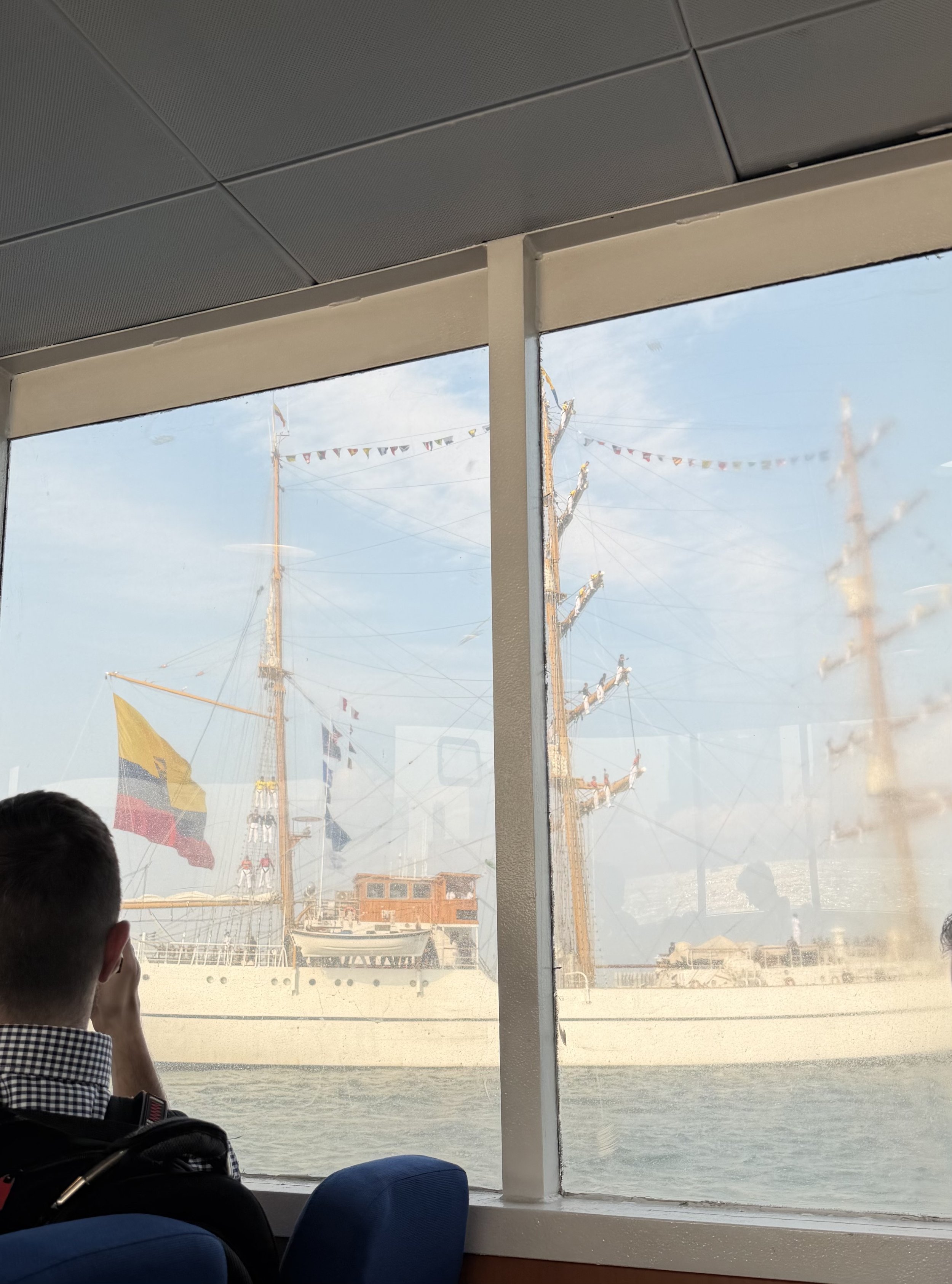 Experiencing the tall ships on the Seaport ferry. -Cela S.
