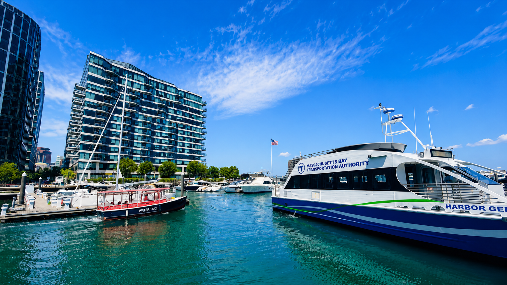 Waterways in Motion
A Boston Water Taxi and an MBTA Harbor Ferry share the harbor on a beautiful summer day in July, showcasing the city’s vibrant waterfront and scenic water transportation. -Lindsay S.