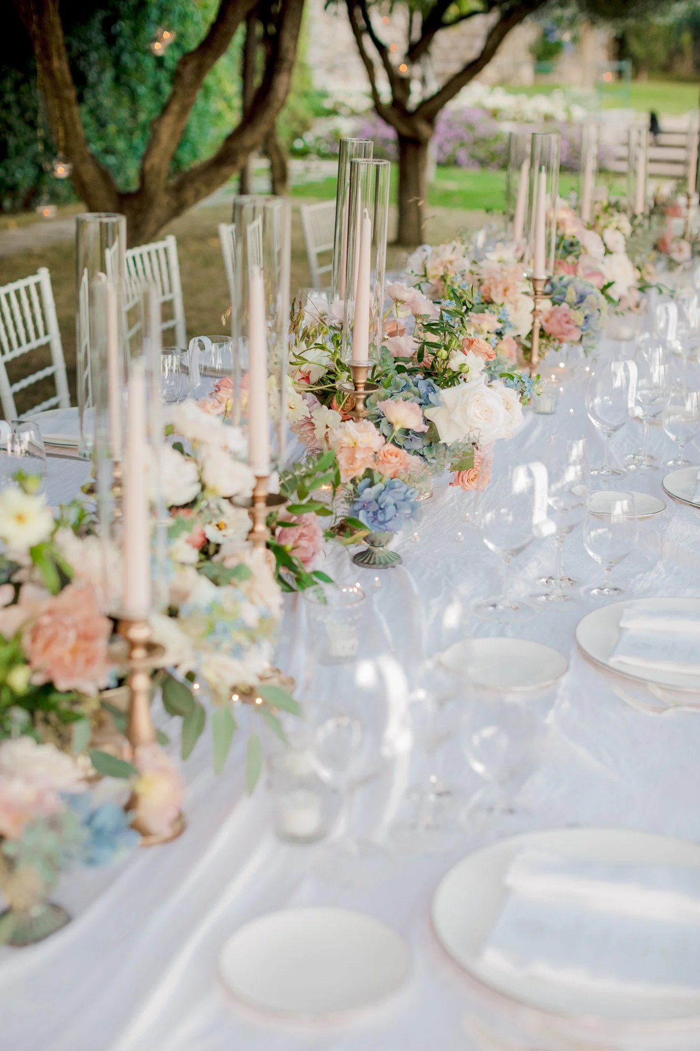 Wedding dinner table at Belmond Caruso featuring floral arrangements and elegant table details