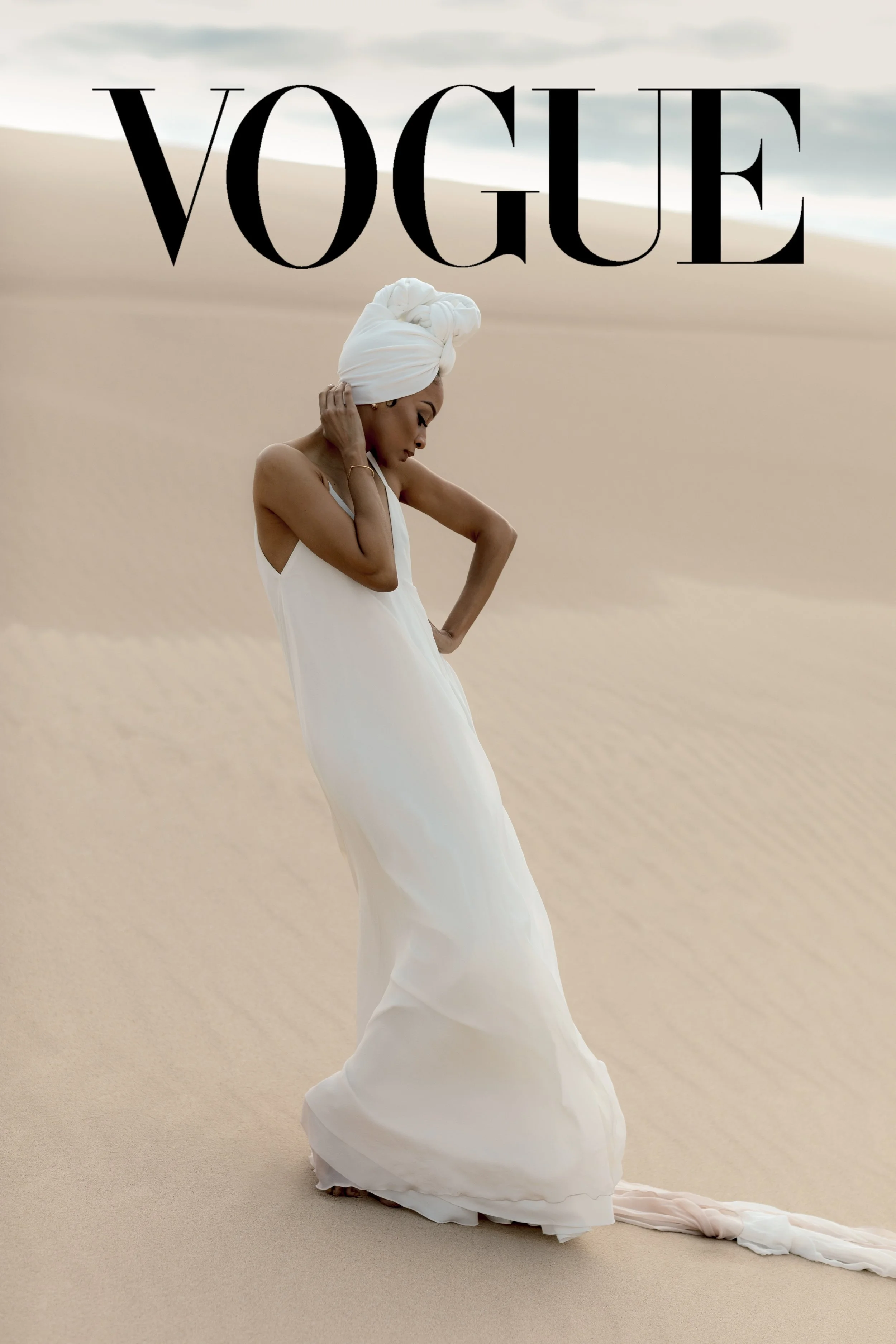 Bride standing on Michigan sand dunes featured on the cover of Vogue magazine