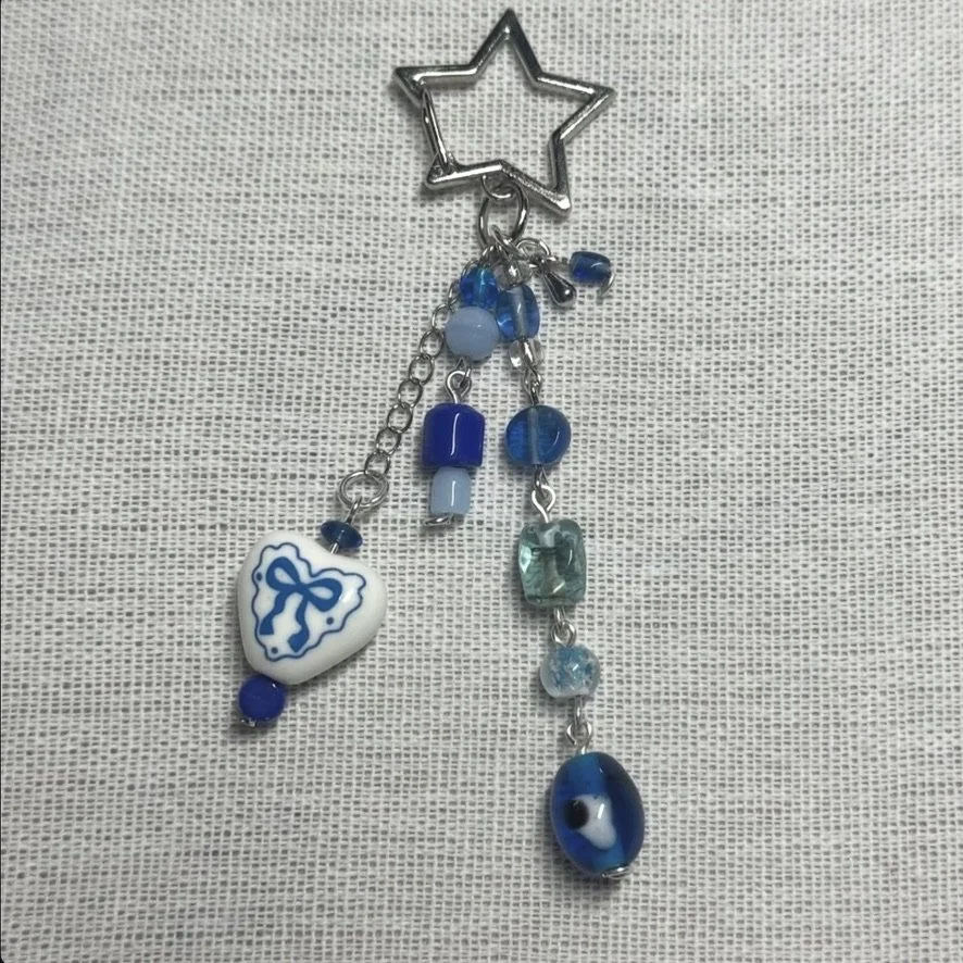 COQUETTE BLUE HEART BAG CHARM