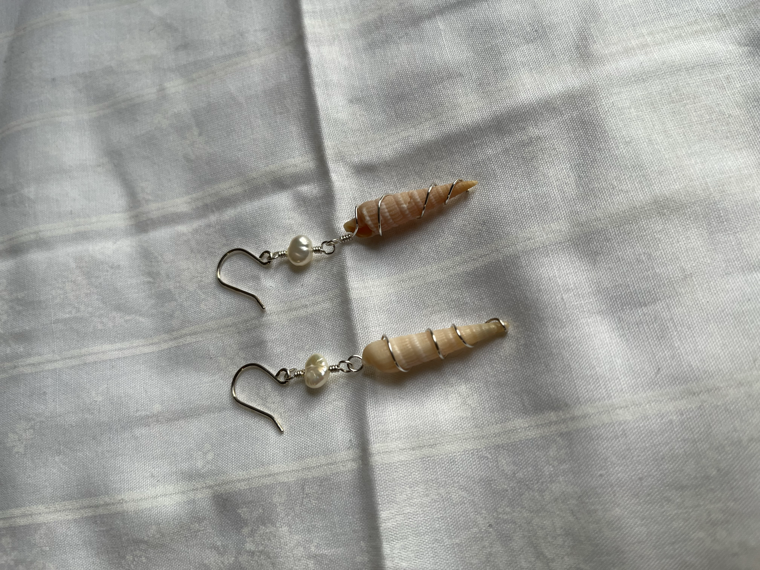 PEARLANDWRAPPEDSHELLEARRINGS.png