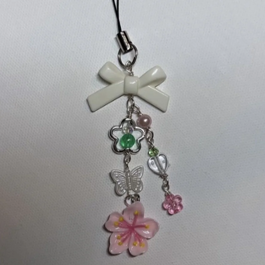 LOADED HIBISCUS PHONE CHARM
